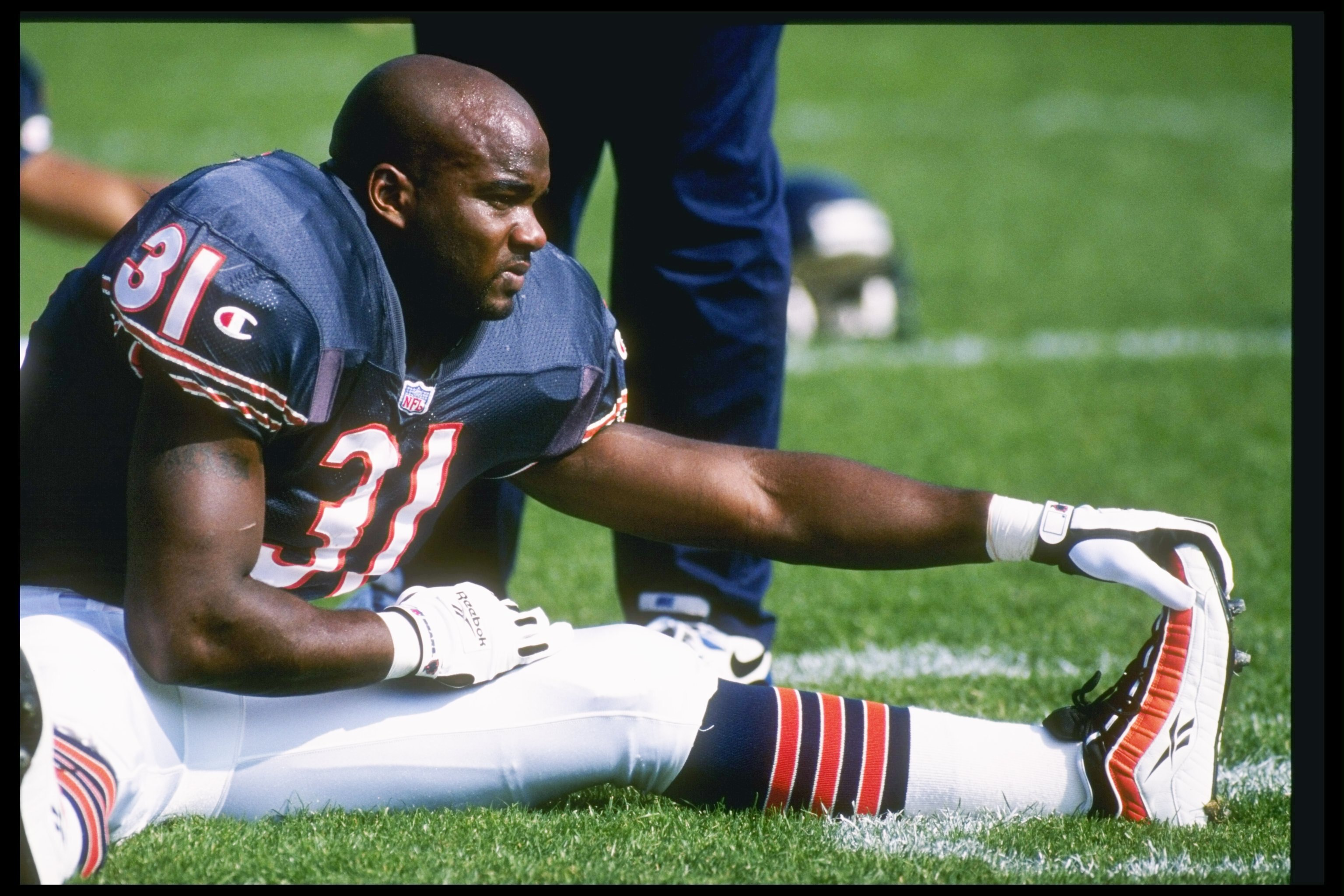 6 Oct 1996:  Runningback Rashan Salaam of the Chicago Bears stretches out before a game against the Green Bay Packers at Soldier Field in Chicago, Illinois.  The Packers won the game 37-6. Mandatory Credit: Jonathan Daniel  /Allsport