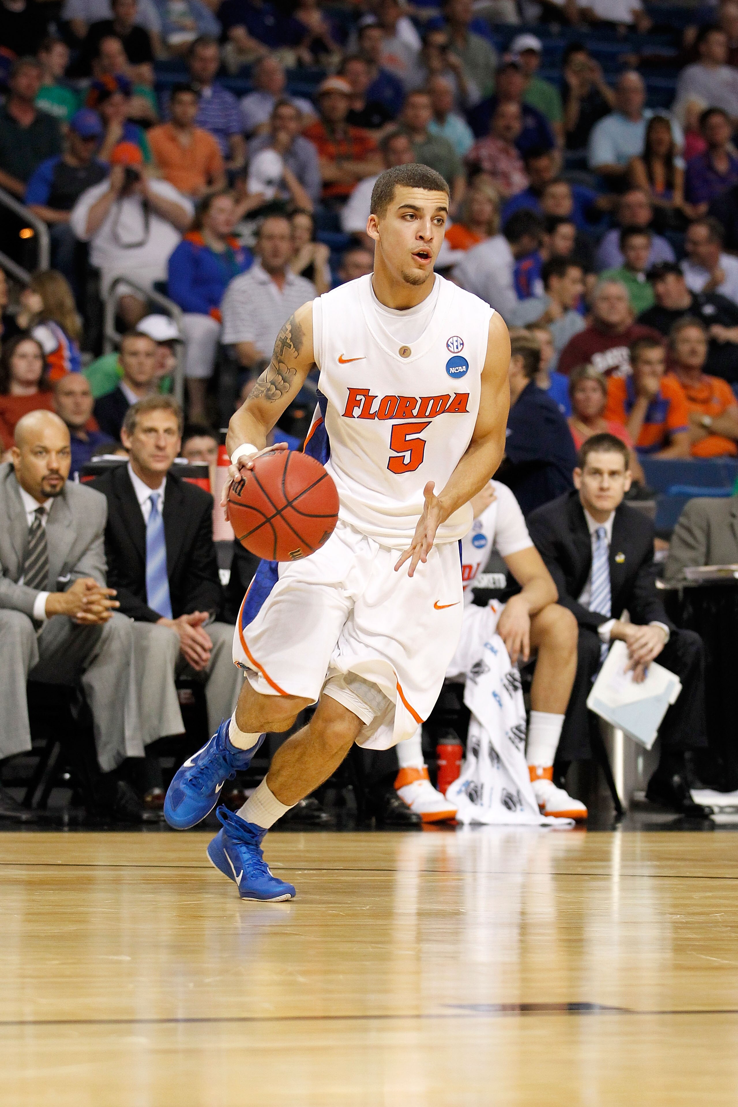 TAMPA, FL - MARCH 17:  Scottie Wilbekin #5 of the Florida Gators drives against the UC Santa Barbara Gauchos during the second round of the 2011 NCAA men's basketball tournament at St. Pete Times Forum on March 17, 2011 in Tampa, Florida. Florida won 79-5
