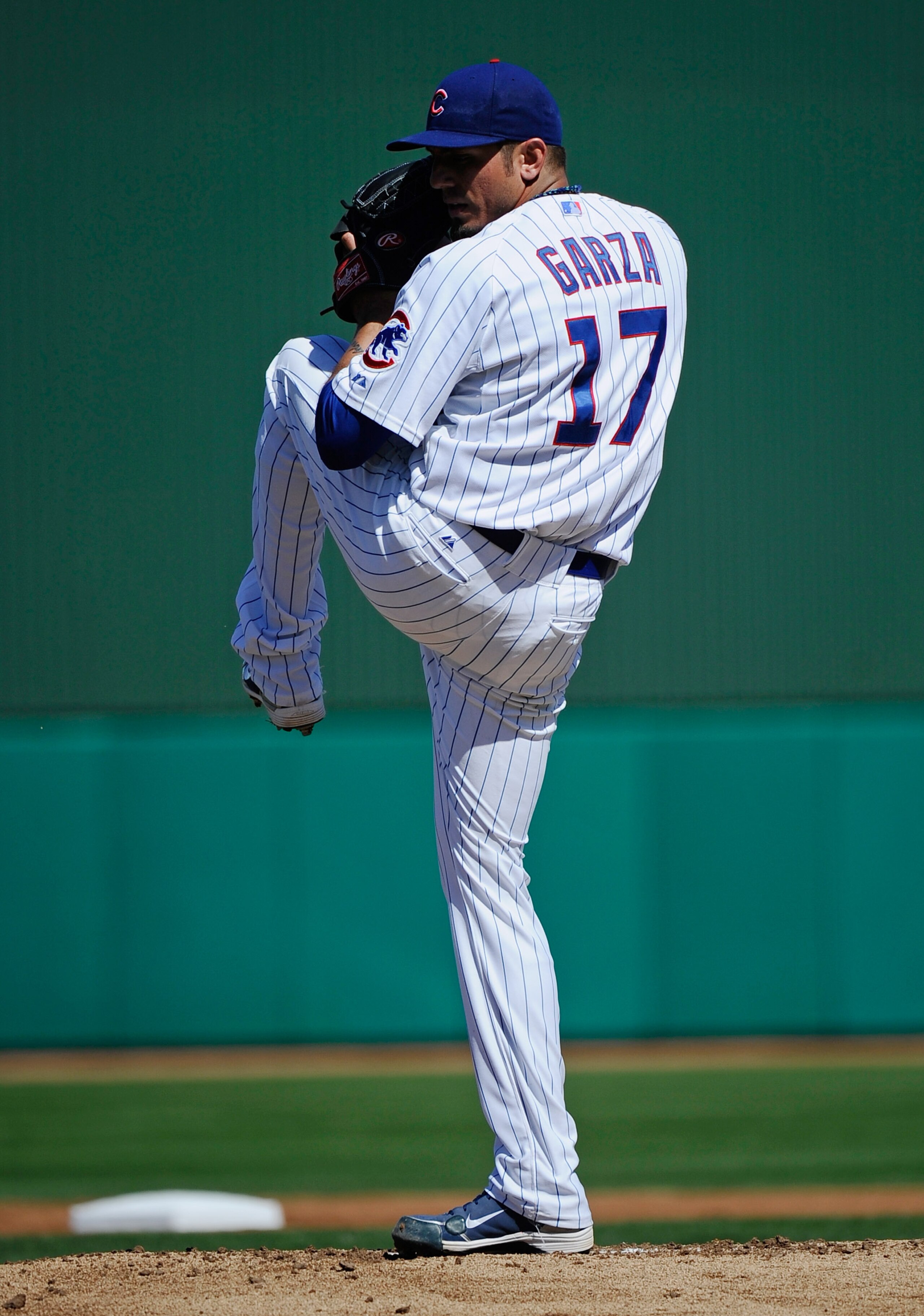 MESA, AZ - MARCH 09:  Matt Garza #17 pitcher of the Chicago Cubs throws a ptich against the Kansas City Royals during the spring training baseball game at HoHoKam Stadium on March 9, 2011 in Mesa, Arizona.  (Photo by Kevork Djansezian/Getty Images)