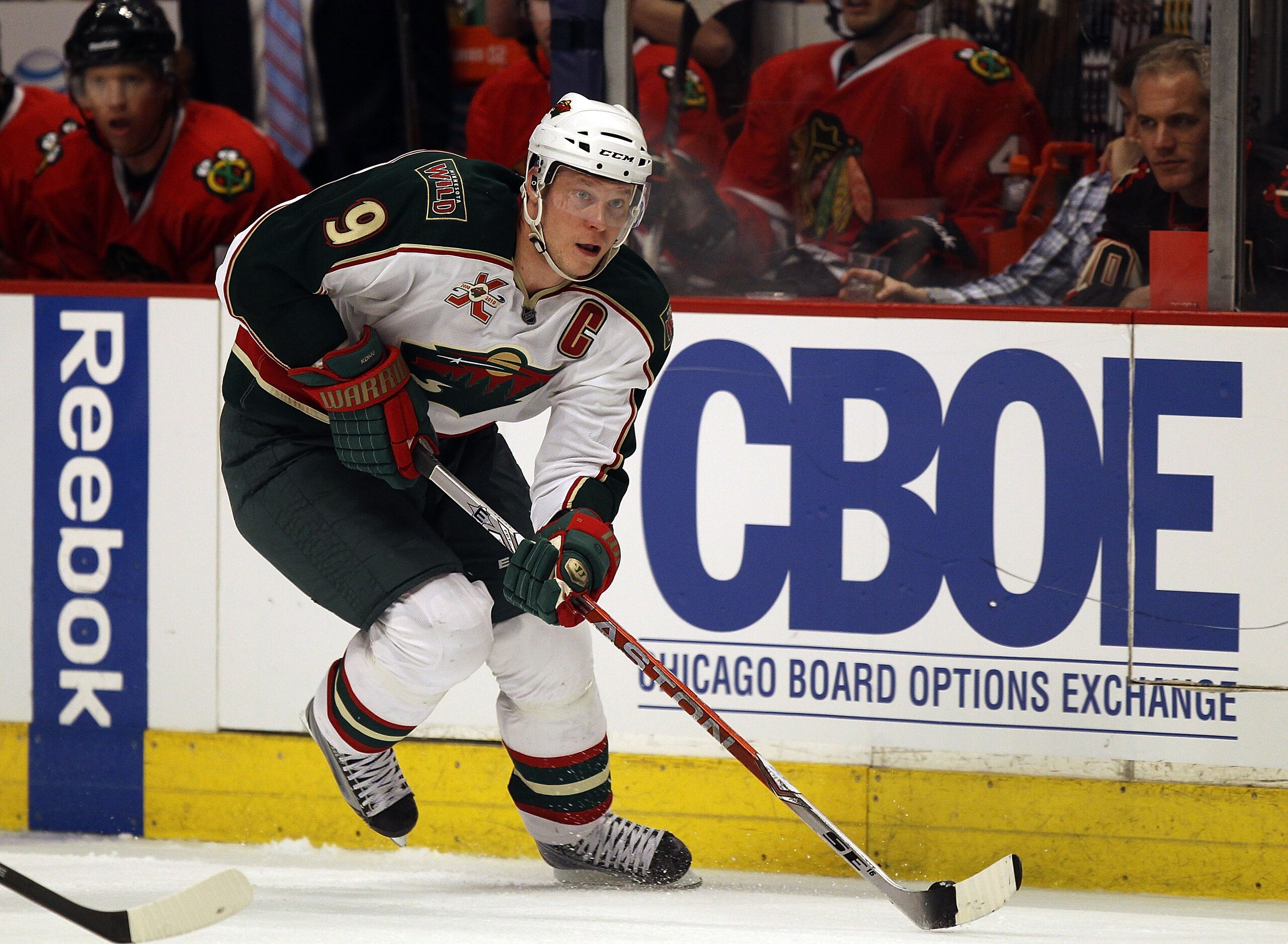 CHICAGO, IL - FEBRUARY 16: Mikko Koivu #9 of the Minnesota Wild skates up the ice against the Chicago Blackhawks at the United Center on February 16, 2011 in Chicago, Illinois. The Blackhawks defeated the Wild 3-1. (Photo by Jonathan Daniel/Getty Images)