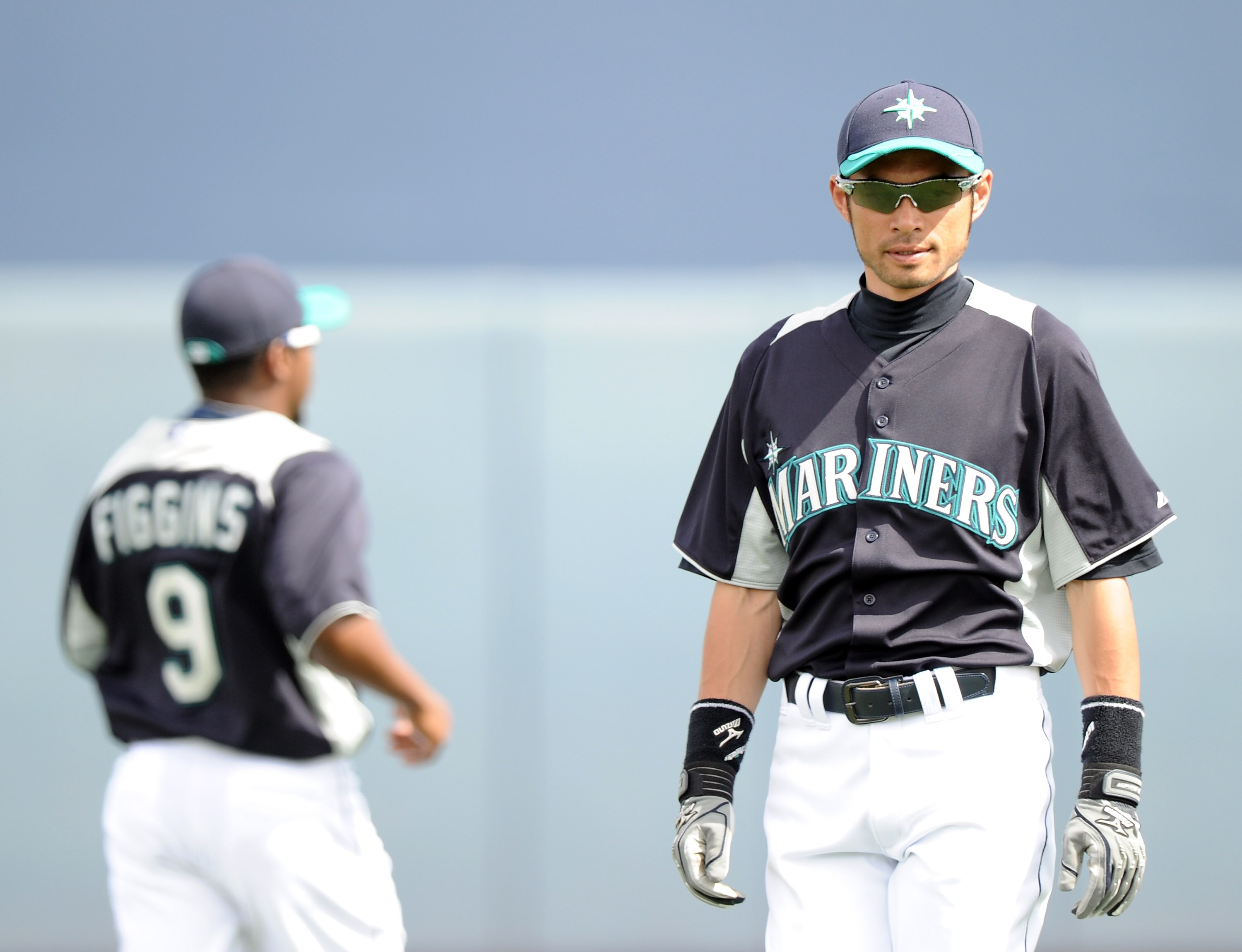 PEORIA, AZ - MARCH 01:  Ichiro Suzuki #51 and Chone Figgins #9 of the Seattle Mariners warm up before the game against the Texas Rangers during spring training at Peoria Stadium on March 1, 2011 in Peoria, Arizona.  (Photo by Harry How/Getty Images)
