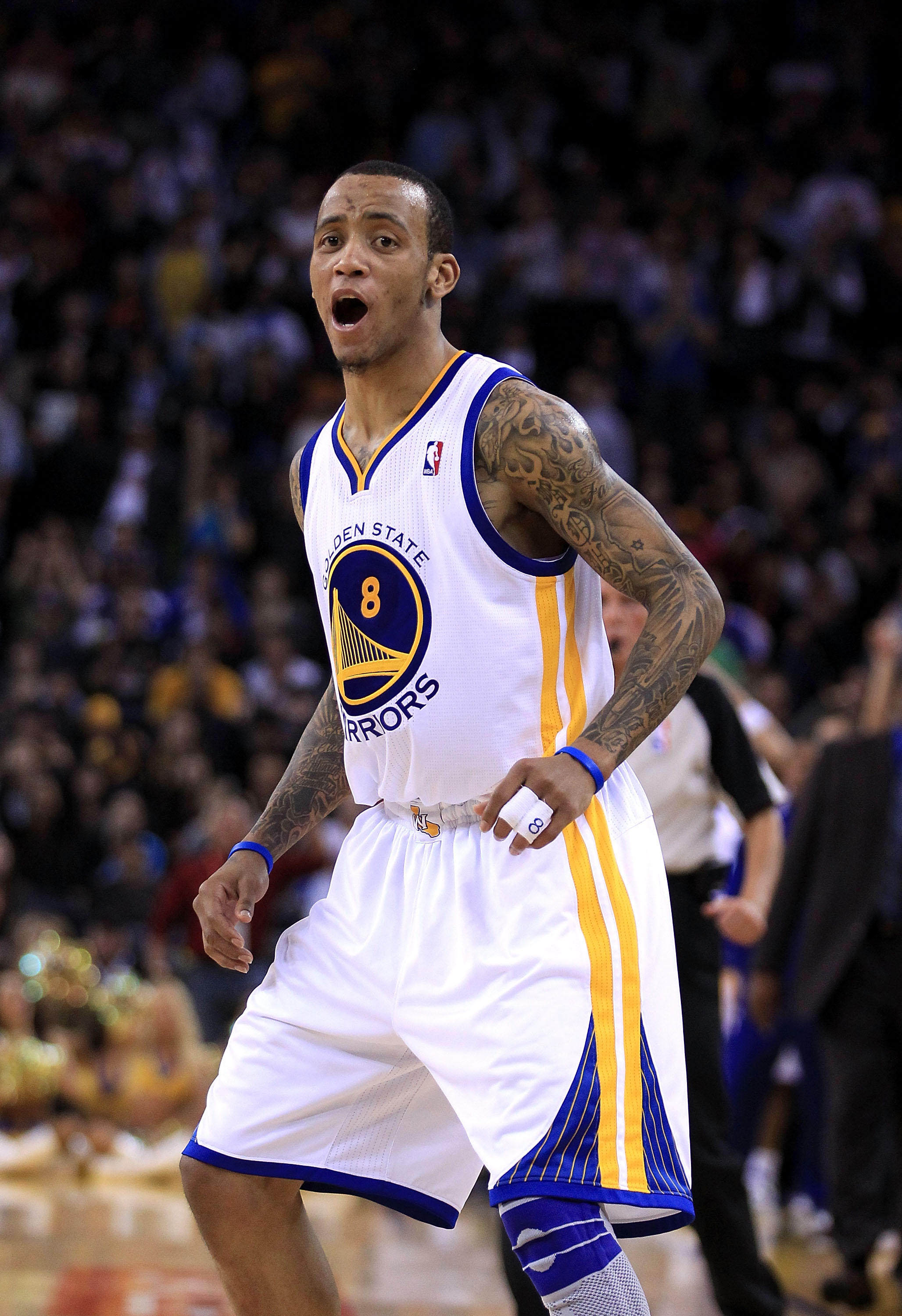 OAKLAND, CA - JANUARY 21: Monta Ellis #8 of the Golden State Warriors reacts after the Warriors made a basket during their game against the Sacramento Kings at Oracle Arena on January 21, 2011 in Oakland, California. NOTE TO USER: User expressly acknowle OAKLAND, CA - JANUARY 21: Monta Ellis #8 of the Golden State Warriors reacts after the Warriors made a basket during their game against the Sacramento Kings at Oracle Arena on January 21, 2011 in Oakland, California. NOTE TO USER: User expressly acknowle