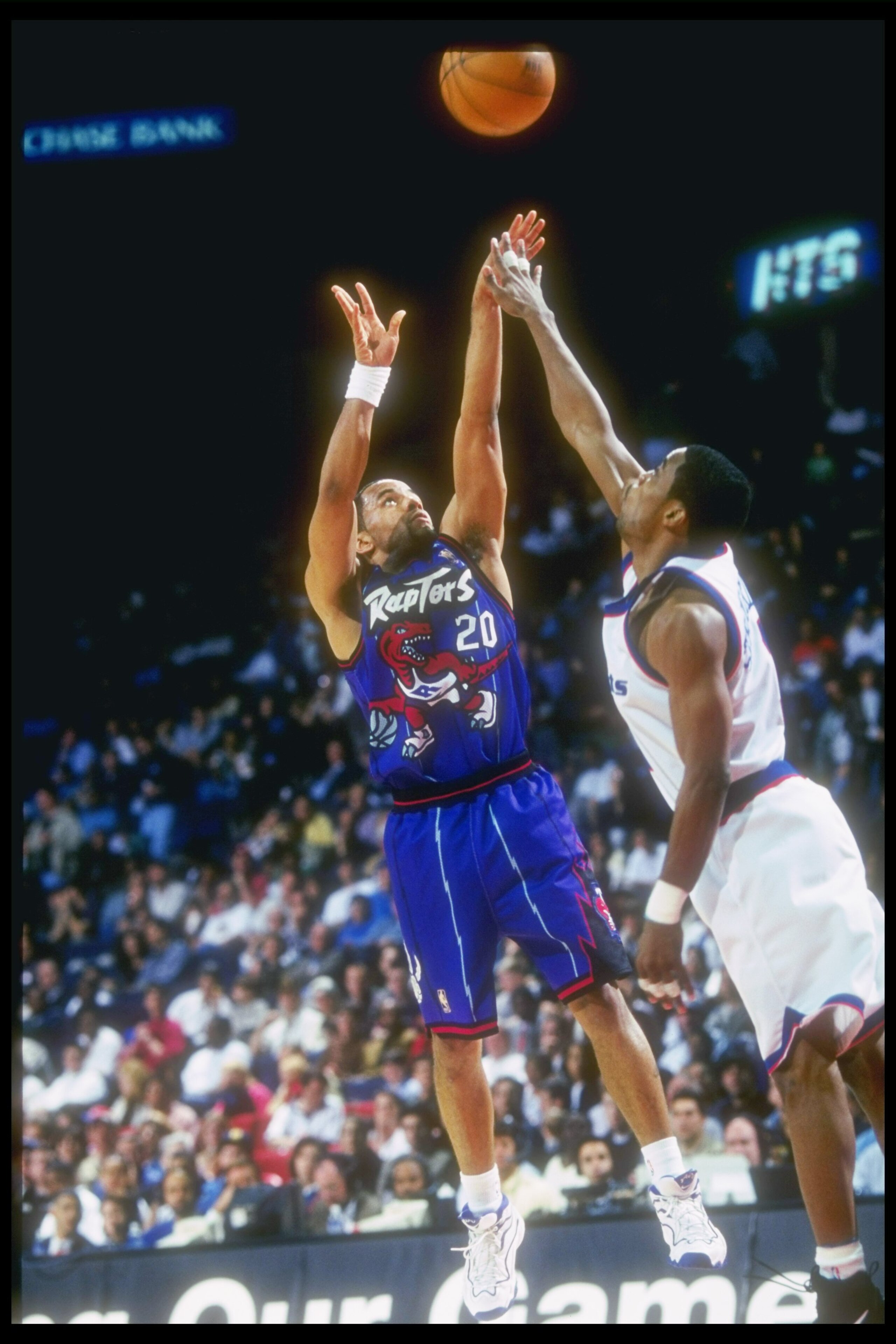 28 Mar 1997:  Guard Damon Stoudamire of the Toronto Raptor''s pulls up for a jump shot over guard Rod Strickland of the Washington Bullets at the US Air Arena in Landover, Maryland.  The Bullets won the game 113 - 86. Mandatory Credit: Doug Pensinger  /Al