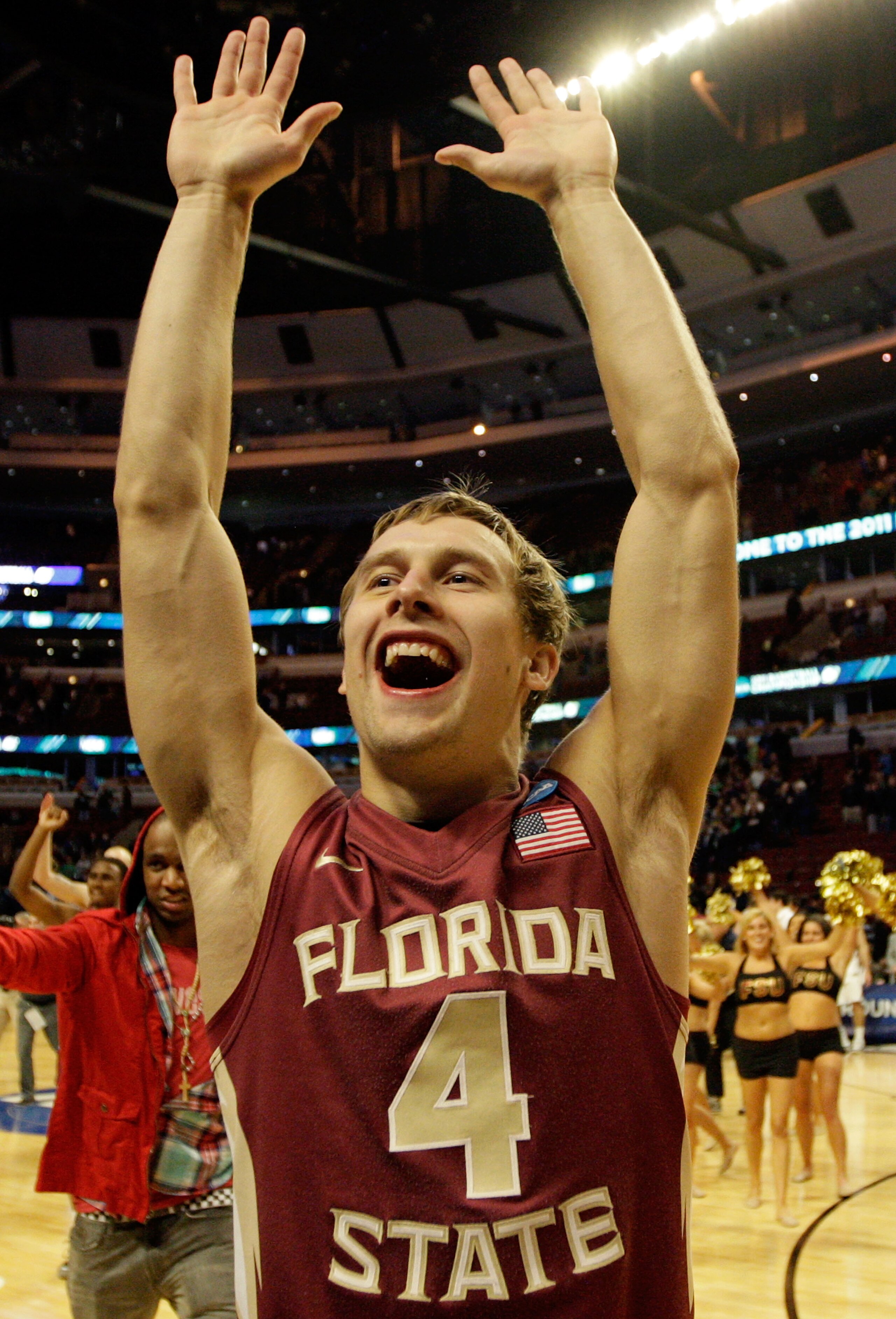 CHICAGO, IL - MARCH 20:  Deividas Dulkys #4 of the Florida State Seminoles celebrates after their 71-57 victory over the Notre Dame Fighting Irish during the third round of the 2011 NCAA men's basketball tournament at the United Center on March 20, 2011 i