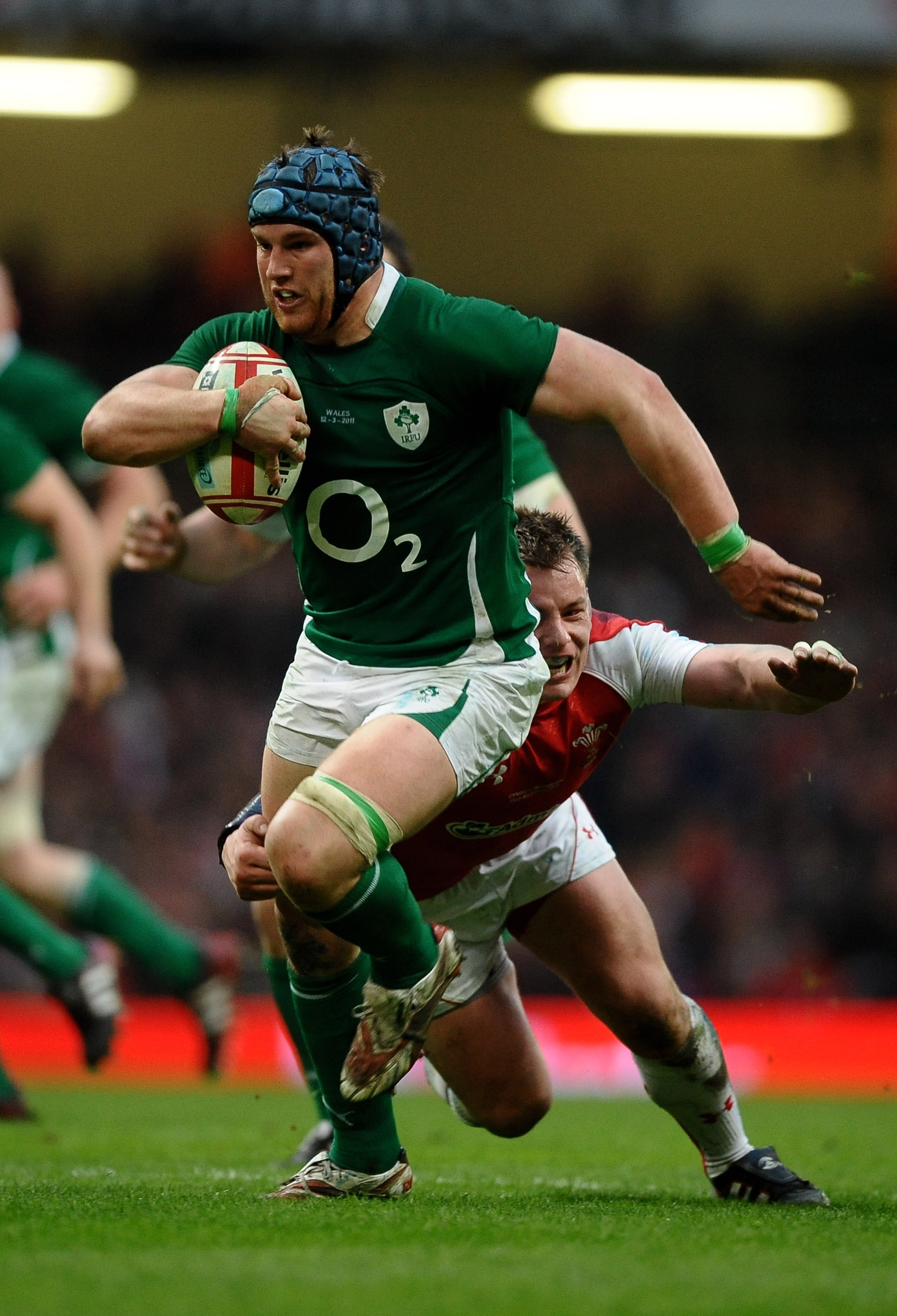 CARDIFF, WALES - MARCH 12:  Sean OÂBrien of Ireland is tackled by Matthew Rees of Wales during the RBS Six Nations Championship match between Wales and Ireland at the Millennium Stadium on March 12, 2011 in Cardiff, Wales.  (Photo by Laurence Griffiths/Ge