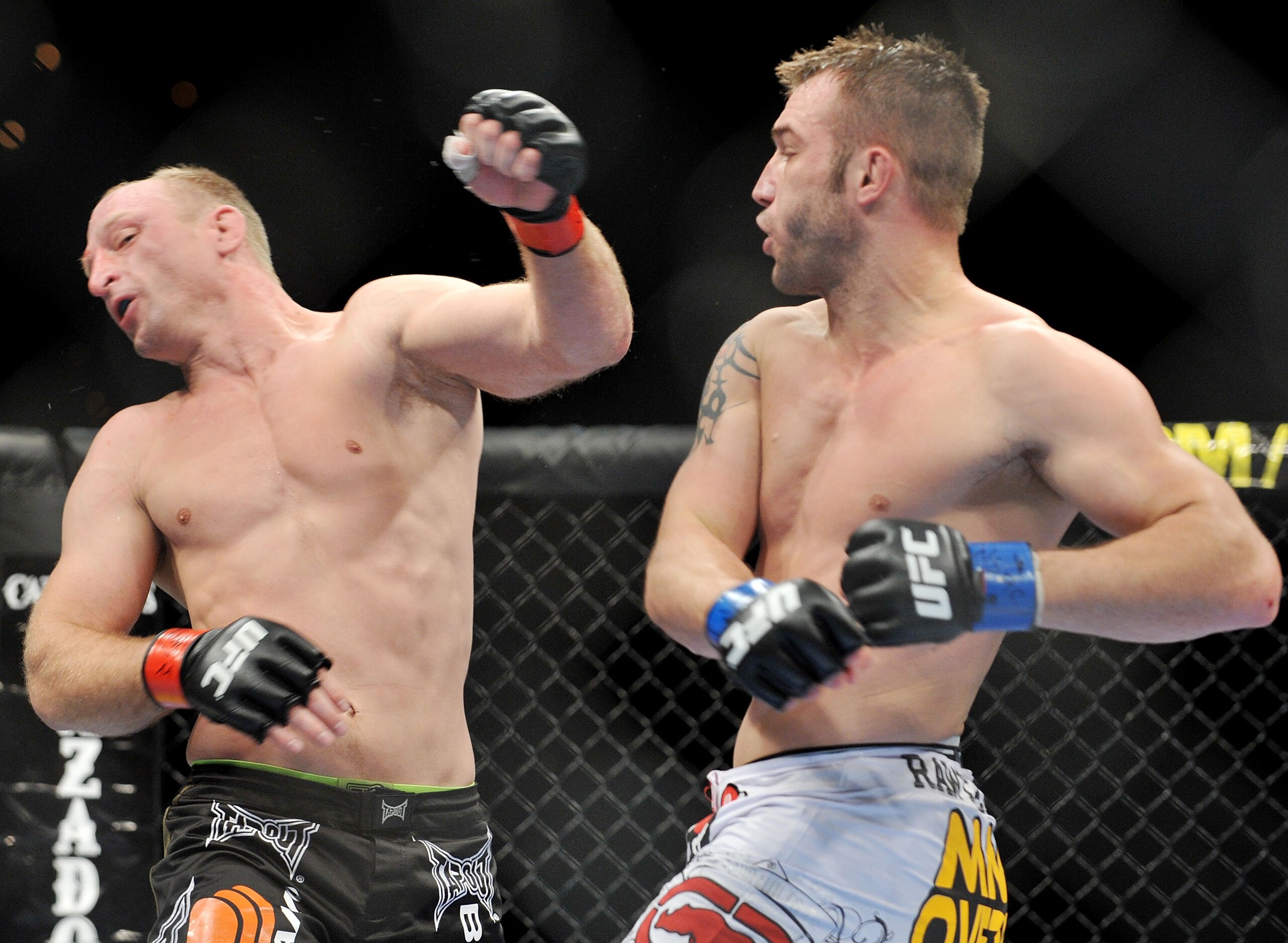 LAS VEGAS - NOVEMBER 21: Brock Larson (L) battles Brian Foster (R) during their Welterweight Fight at the UFC 106 at Mandalay Bay Events Center on November 21, 2009 in Las Vegas, Nevada. (Photo by Jon Kopaloff/Getty Images)