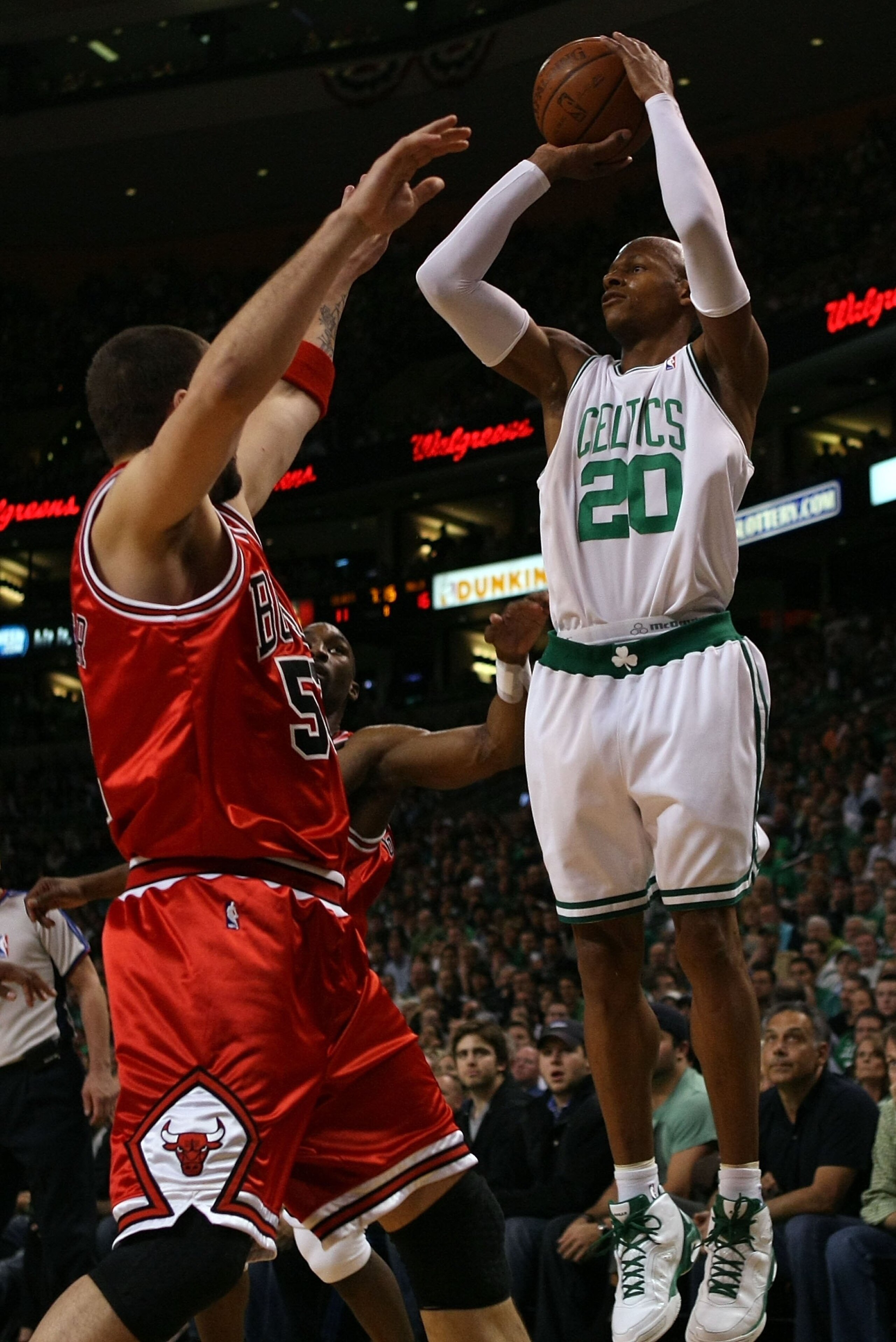 BOSTON - MAY 02:  Ray Allen #20 of the Boston Celtics takes a shot over Brad Miller #52 of the Chicago Bulls in Game Seven of the Eastern Conference Quarterfinals during the 2009 NBA Playoffs at TD Banknorth Garden on May 2, 2009 in Boston, Massachusetts.