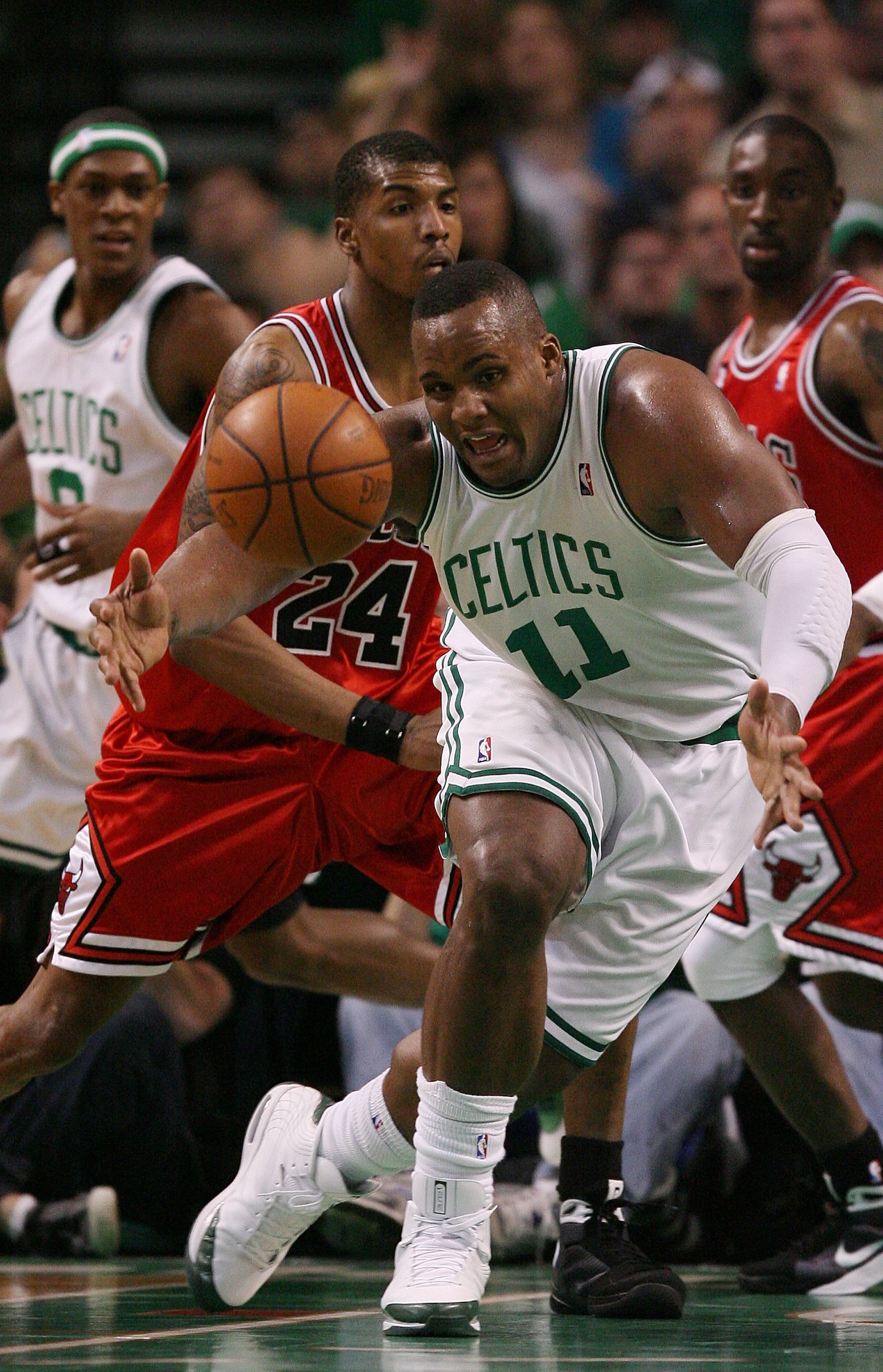 BOSTON - MAY 02:  Glen Davis #11 of the Boston Celtics loses the ball as Tyrus Thomas #24 of the Chicago Bulls defends in Game Seven of the Eastern Conference Quarterfinals during the 2009 NBA Playoffs at TD Banknorth Garden on May 2, 2009 in Boston, Mass