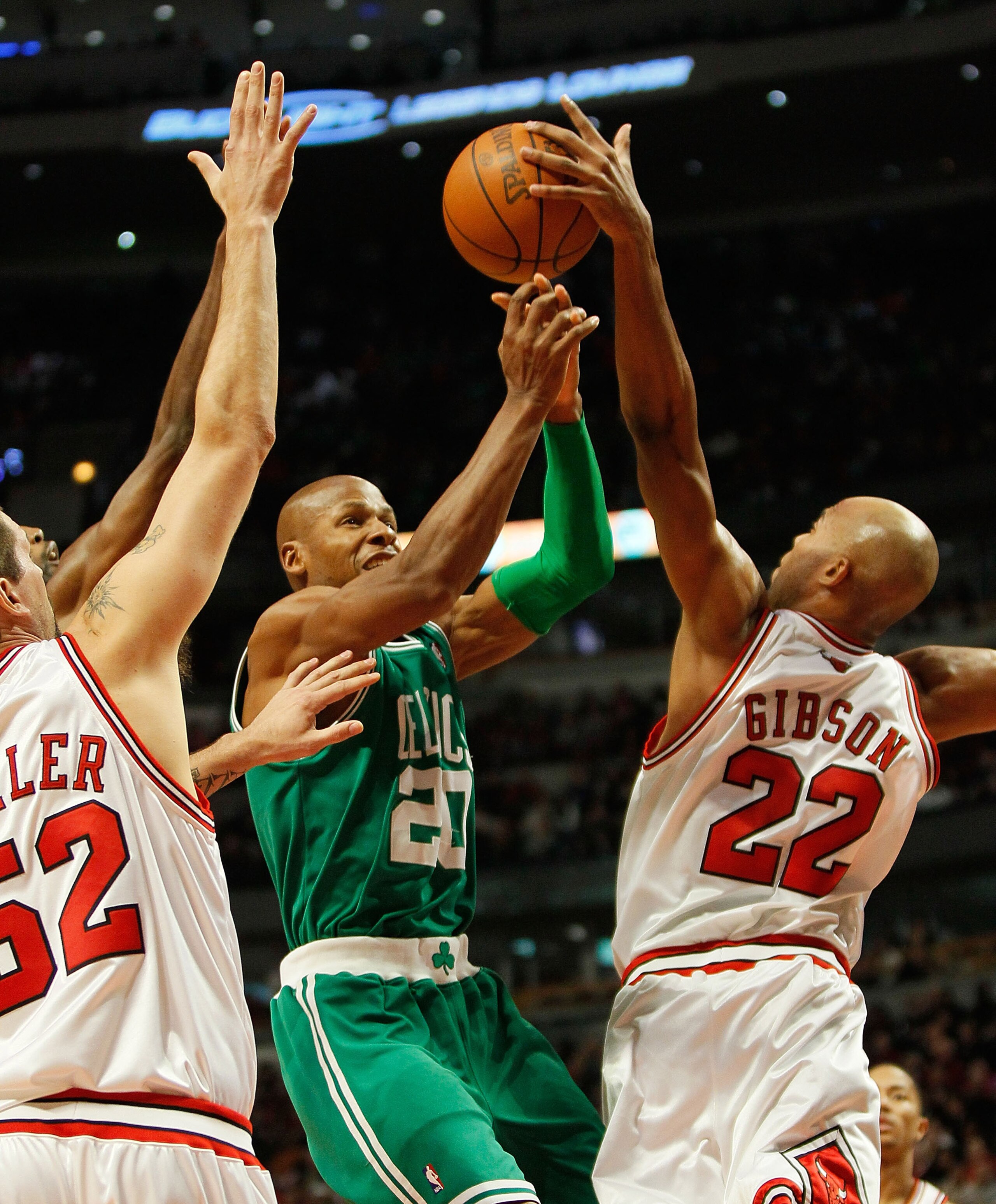 CHICAGO - DECEMBER 12: Taj Gibson #22 of the Chicago Bulls blocks a shot by Ray Allen #20 of the Boston Celtics at the United Center on December 12, 2009 in Chicago, Illinois. NOTE TO USER: User expressly acknowledges and agrees that, by downloading and/o