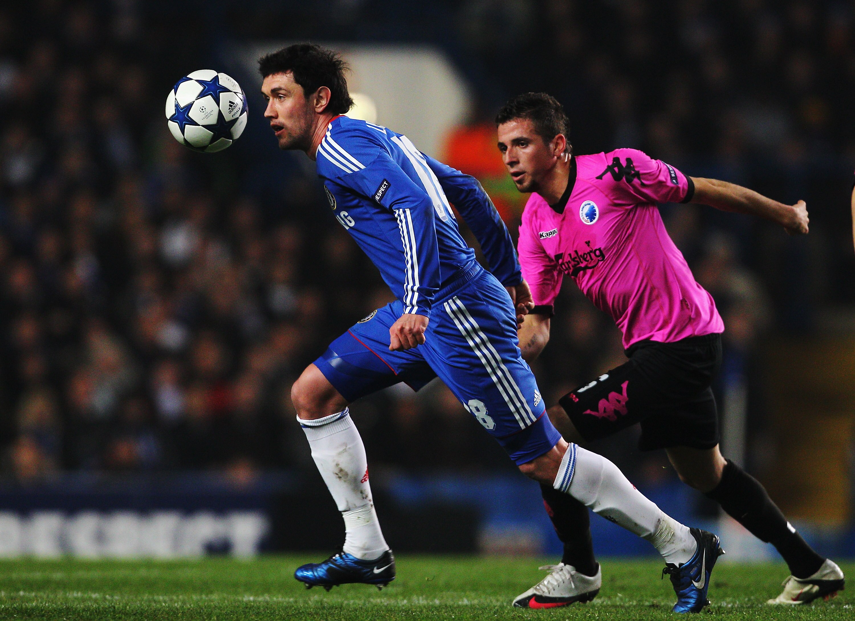 LONDON, UNITED KINGDOM - MARCH 16: Yuri Zhirkov (L) of Chelsea holds off Claudemir (R) of FC Copenhagen during the UEFA Champions League round of sixteen second leg match between Chelsea and FC Copenhagen at Stamford Bridge on March 16, 2011 in London, E LONDON, UNITED KINGDOM - MARCH 16: Yuri Zhirkov (L) of Chelsea holds off Claudemir (R) of FC Copenhagen during the UEFA Champions League round of sixteen second leg match between Chelsea and FC Copenhagen at Stamford Bridge on March 16, 2011 in London, E