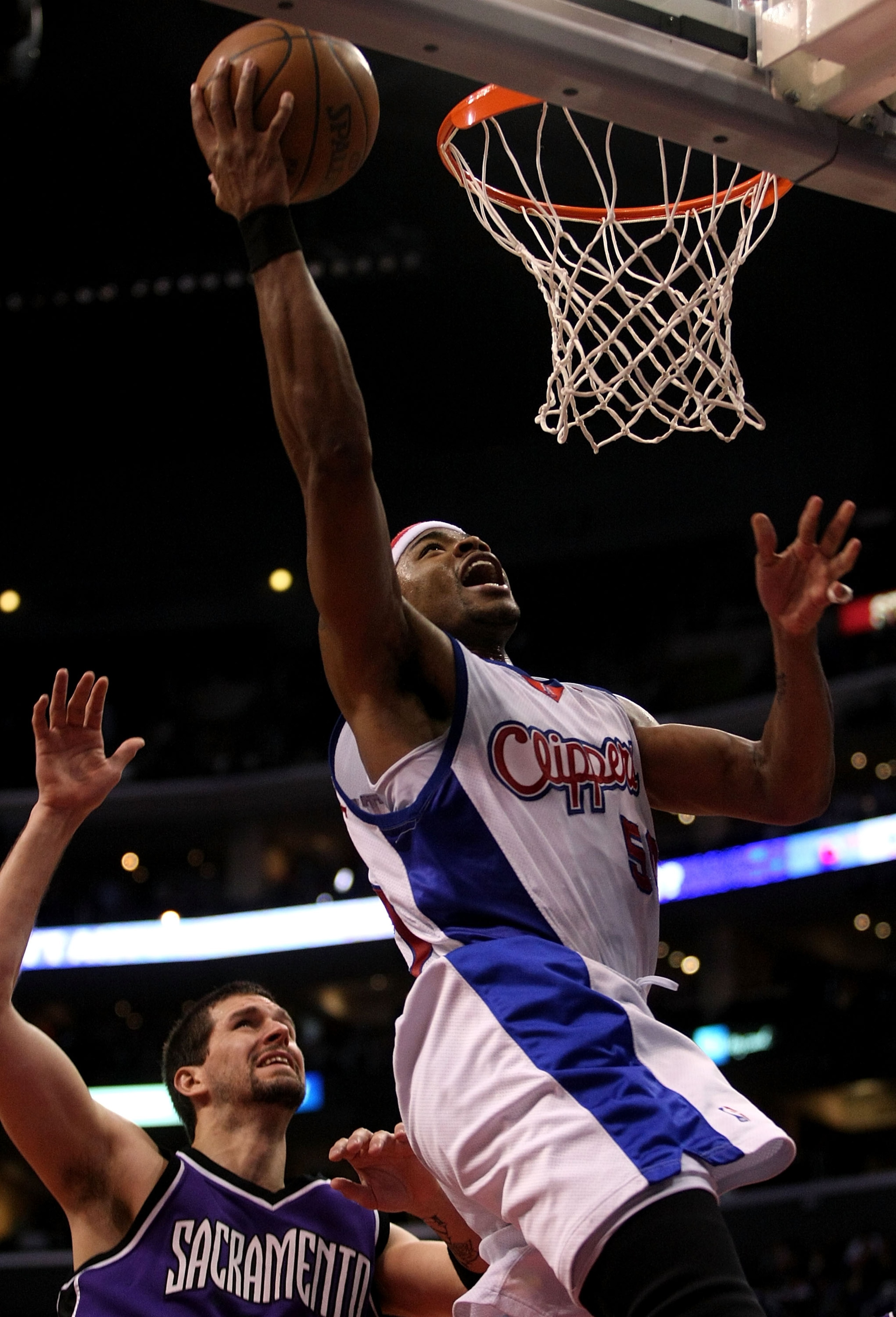 LOS ANGELES, CA - JANUARY 23:  Corey Maggette #50 of the Los Angeles Clippers shoots over Brad Miller #52 of the Sacramento Kings on January 23, 2008 at Staples Center in Los Angeles, California.   The Clippers won 111-85.  NOTE TO USER: User expressly ac