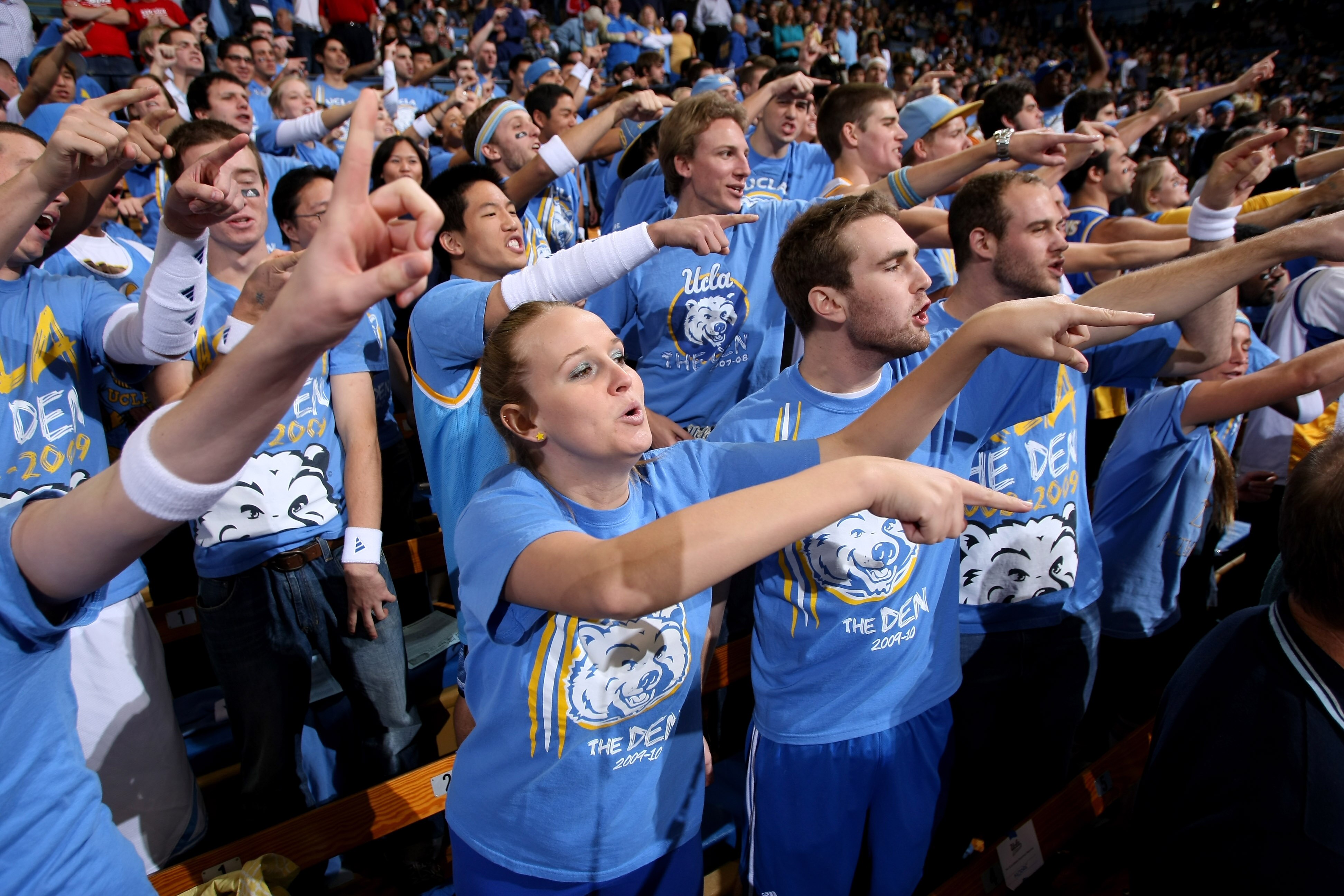 WESTWOOD, CA - DECEMBER 06:  The student section of the UCLA Bruins point at the Kansas Jayhawks as they warm up on December 6, 2009 at Pauley Pavillion in Westwood, California.  Kansas won 73-61.  (Photo by Stephen Dunn/Getty Images)