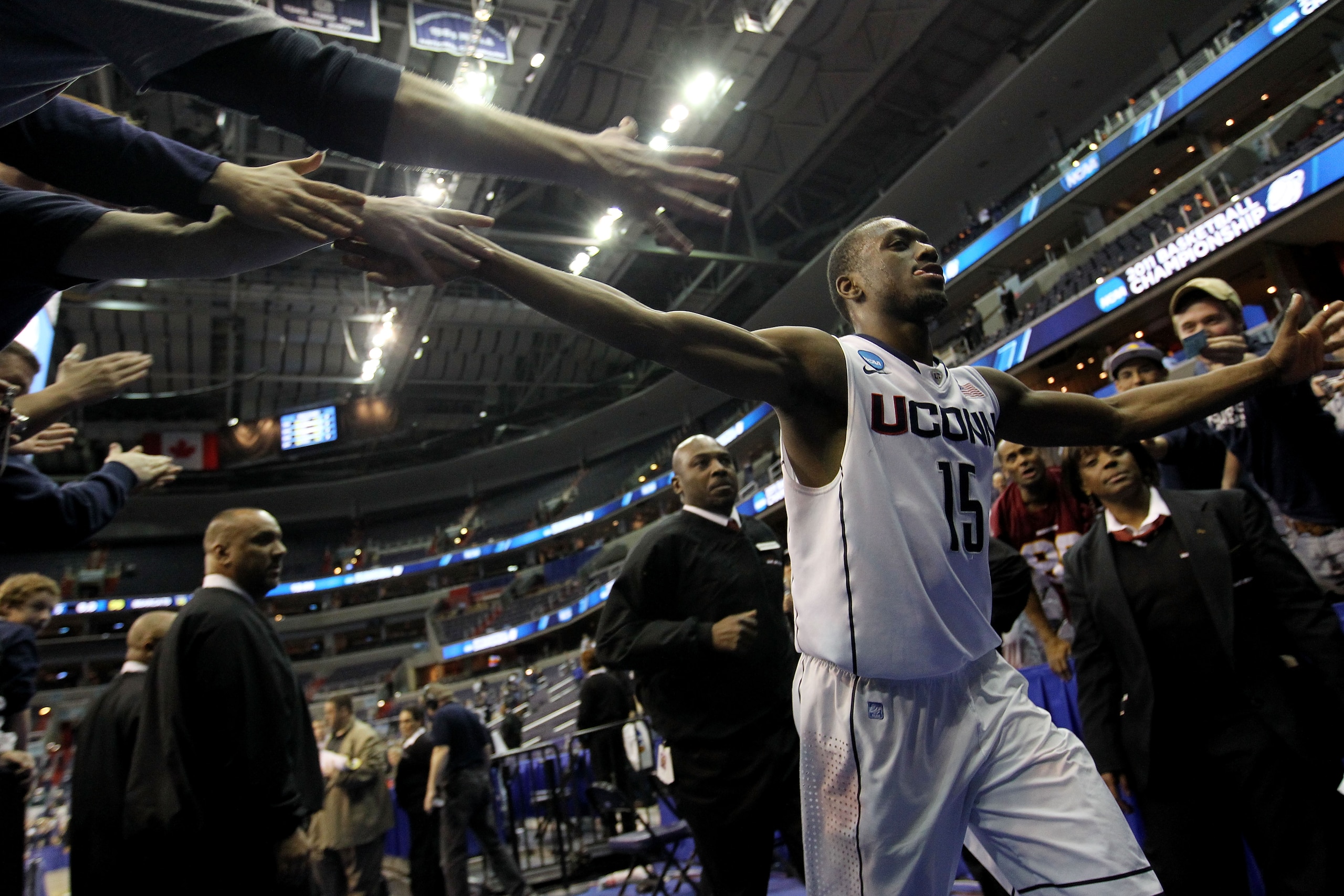 WASHINGTON - MARCH 19:  Kemba Walker #15 of the Connecticut Huskies celebrates their 69-58 win over the Cincinnati Bearcats during the third round of the 2011 NCAA men's basketball tournament at Verizon Center on March 19, 2011 in Washington, DC.  (Photo