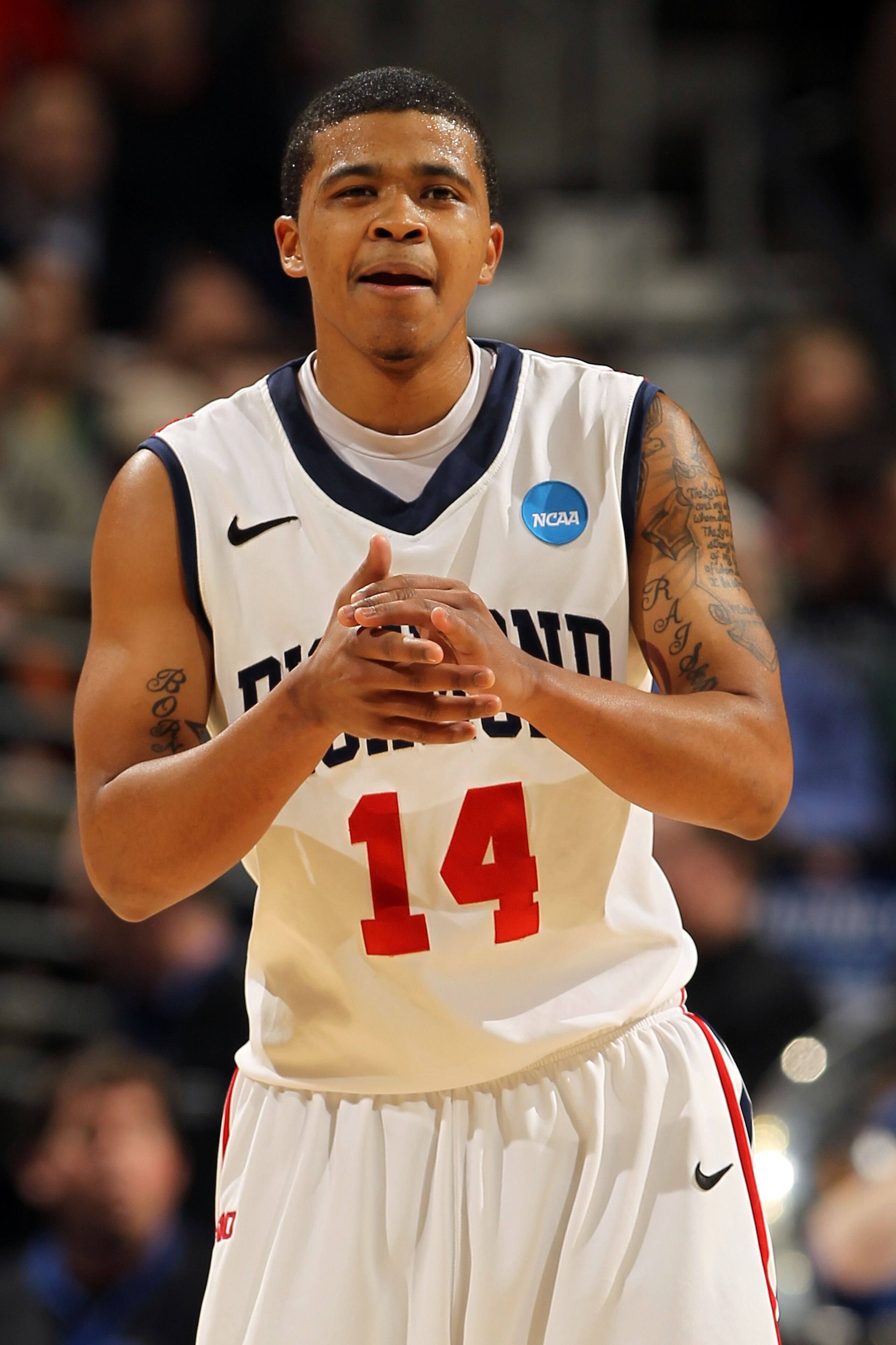 DENVER, CO - MARCH 19:  Kevin Anderson #14 of the Richmond Spiders reacts after a play during the third round of the 2011 NCAA men's basketball tournament at Pepsi Center on March 19, 2011 in Denver, Colorado.  (Photo by Doug Pensinger/Getty Images)