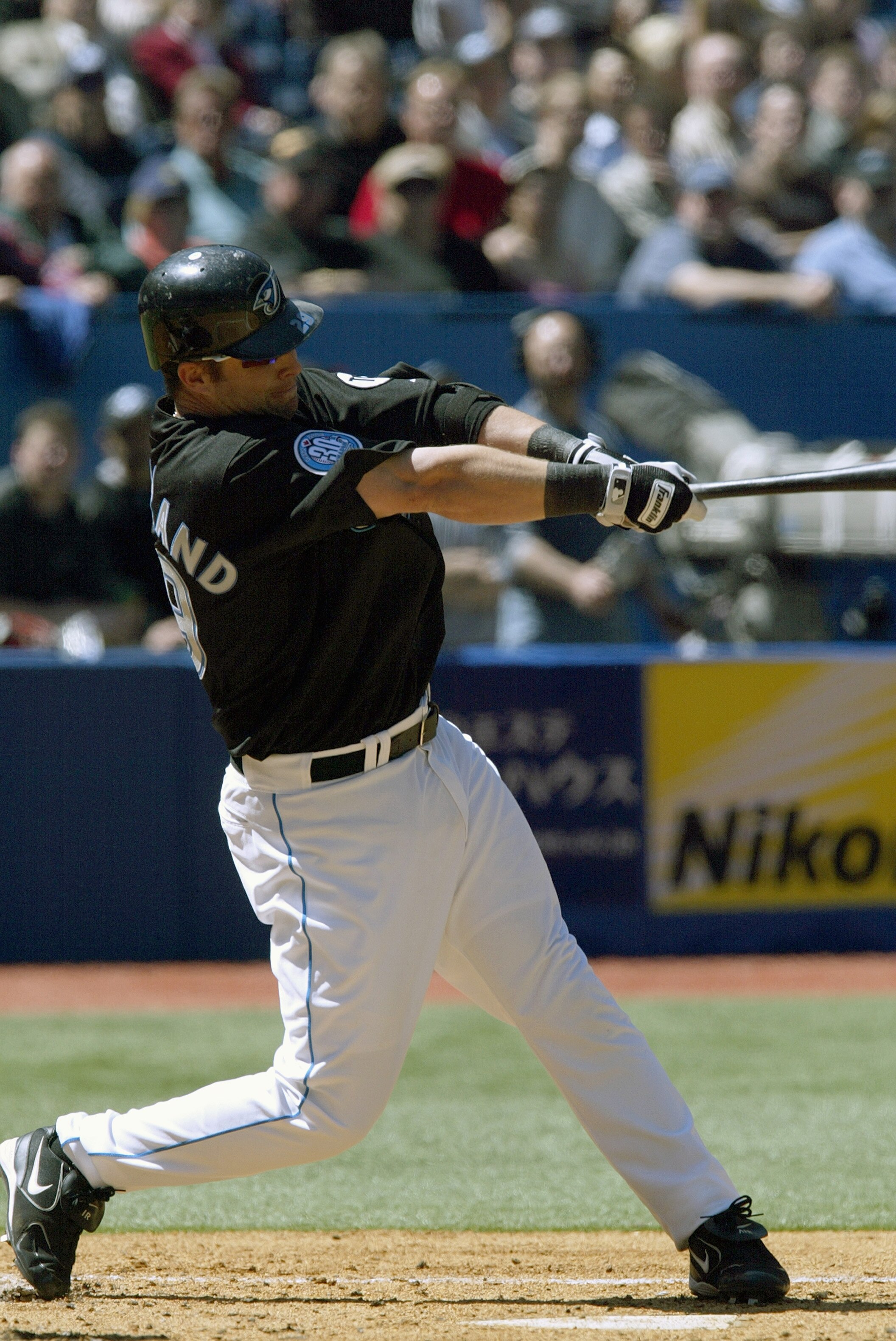 TORONTO - APRIL 19:  Shea Hillenbrand #29 of the Toronto Blue Jays bats against the New York Yankees at the Rogers Centre on April 19, 2006 in Toronto, Ontario, Canada. The Yankees defeated the Blue Jays 3-1. (Photo by Dave Sandford/Getty Images)