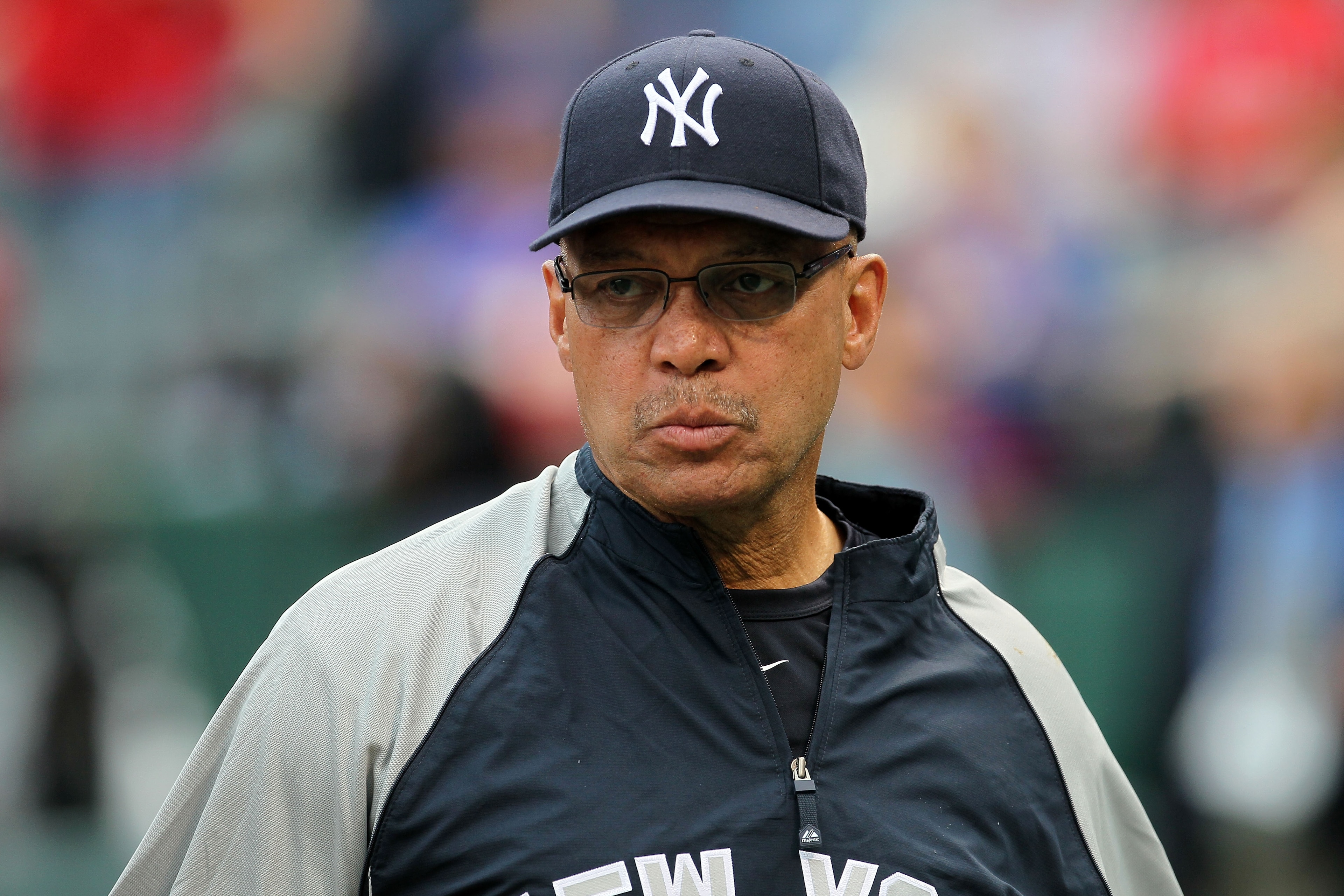ARLINGTON, TX - OCTOBER 22: Baseball Hall of Famer Reggie Jackson looks on during batting prior to the New York Yankees playing against the Texas Rangers in Game Six of the ALCS during the 2010 MLB Playoffs at Rangers Ballpark in Arlington on October 22, ARLINGTON, TX - OCTOBER 22: Baseball Hall of Famer Reggie Jackson looks on during batting prior to the New York Yankees playing against the Texas Rangers in Game Six of the ALCS during the 2010 MLB Playoffs at Rangers Ballpark in Arlington on October 22,