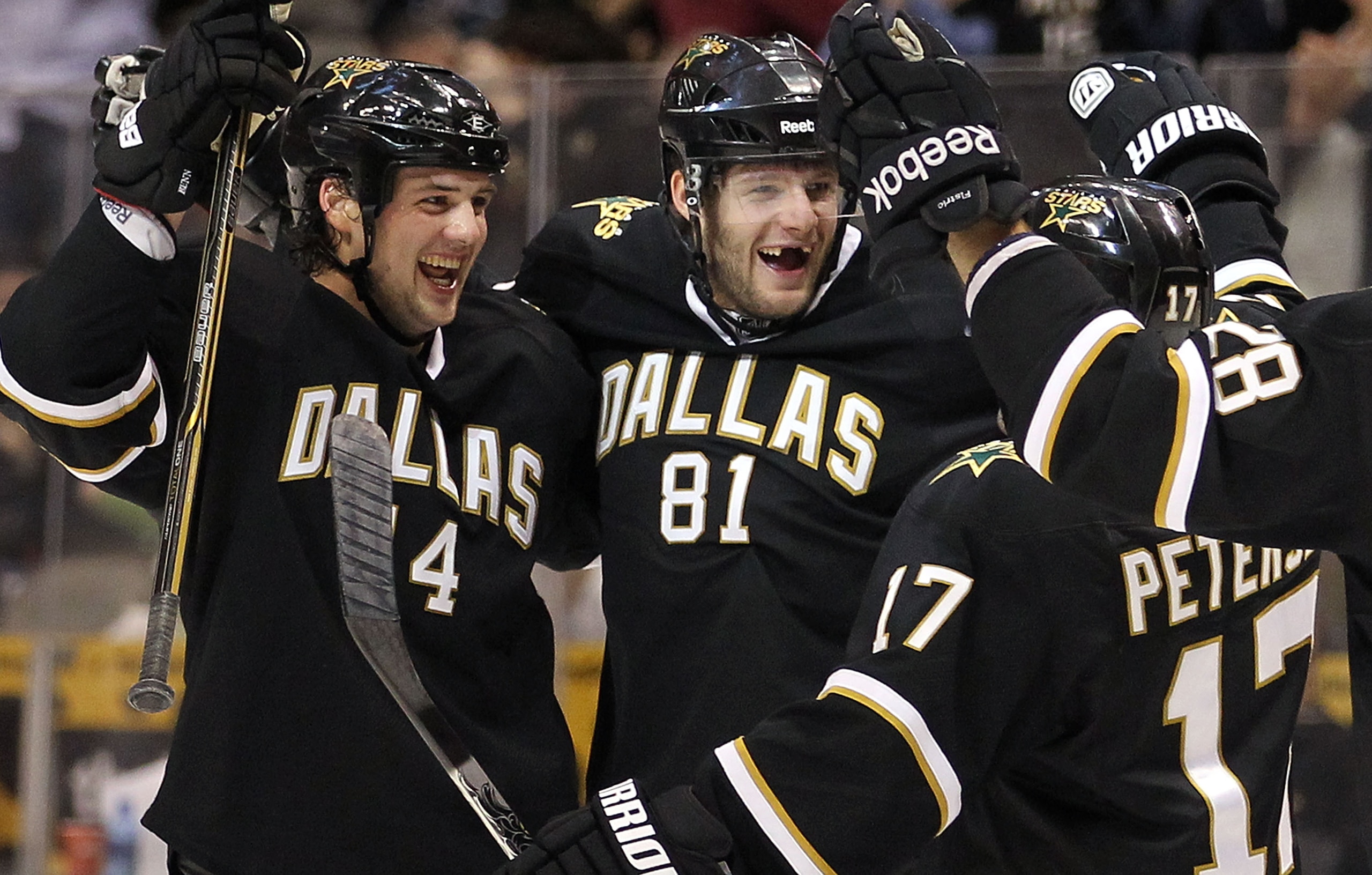 DALLAS, TX - MARCH 09: Center Tomas Vincour #81 of the Dallas Stars celebrates his first NHL goal with Jamie Benn #14 and Toby Petersen #17 against the Calgary Flames at American Airlines Center on March 9, 2011 in Dallas, Texas. (Photo by Ronald Martin DALLAS, TX - MARCH 09: Center Tomas Vincour #81 of the Dallas Stars celebrates his first NHL goal with Jamie Benn #14 and Toby Petersen #17 against the Calgary Flames at American Airlines Center on March 9, 2011 in Dallas, Texas. (Photo by Ronald Martin