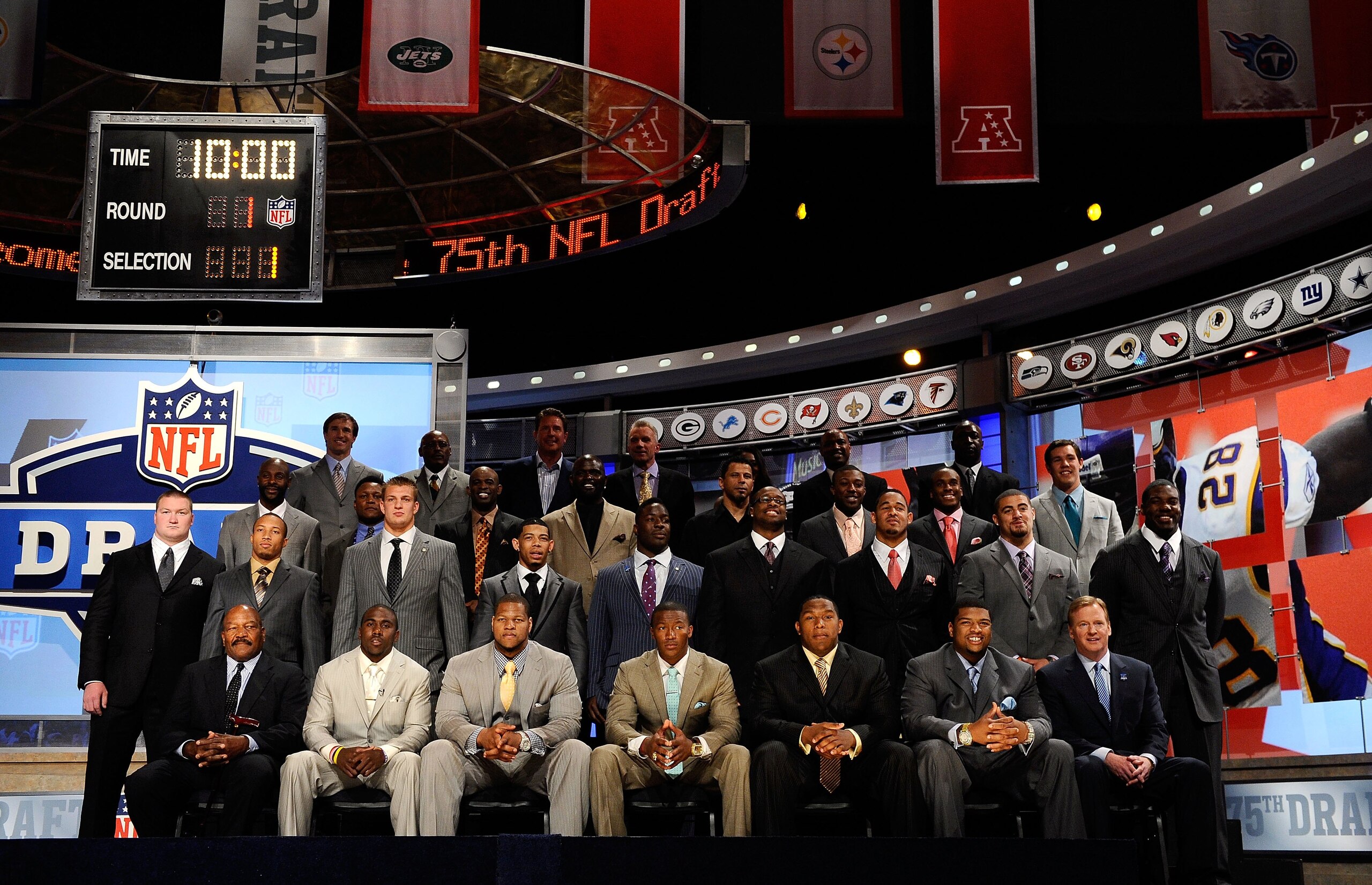 NEW YORK - APRIL 22: 2010 NFL Draft prospects pose for a group photo with NFL Commissioner Roger Goodell along with former and current NFL Players including Jim Brown, Jerry Rice, Dan Marino, Lawrence Taylor, Deion Sanders, Barry Sanders, Joe Montana, Fl NEW YORK - APRIL 22: 2010 NFL Draft prospects pose for a group photo with NFL Commissioner Roger Goodell along with former and current NFL Players including Jim Brown, Jerry Rice, Dan Marino, Lawrence Taylor, Deion Sanders, Barry Sanders, Joe Montana, Fl