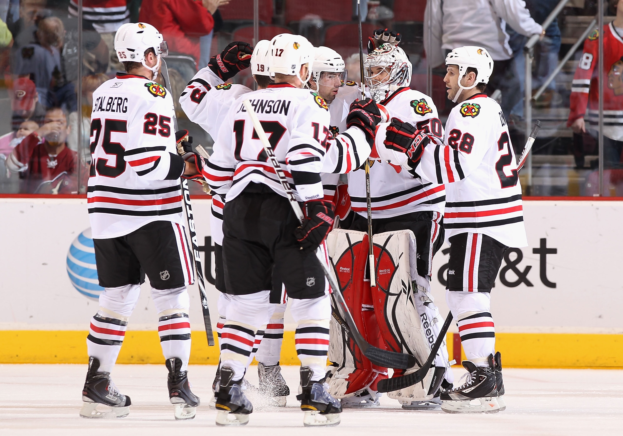 GLENDALE, AZ - MARCH 20: Goaltender Corey Crawford #50 of the Chicago Blackhawks celebrates with teammates after defeating the Phoenix Coyotes in the NHL game at Jobing.com Arena on March 20, 2011 in Glendale, Arizona. The Blackhawks defeated the Coyote GLENDALE, AZ - MARCH 20: Goaltender Corey Crawford #50 of the Chicago Blackhawks celebrates with teammates after defeating the Phoenix Coyotes in the NHL game at Jobing.com Arena on March 20, 2011 in Glendale, Arizona. The Blackhawks defeated the Coyote