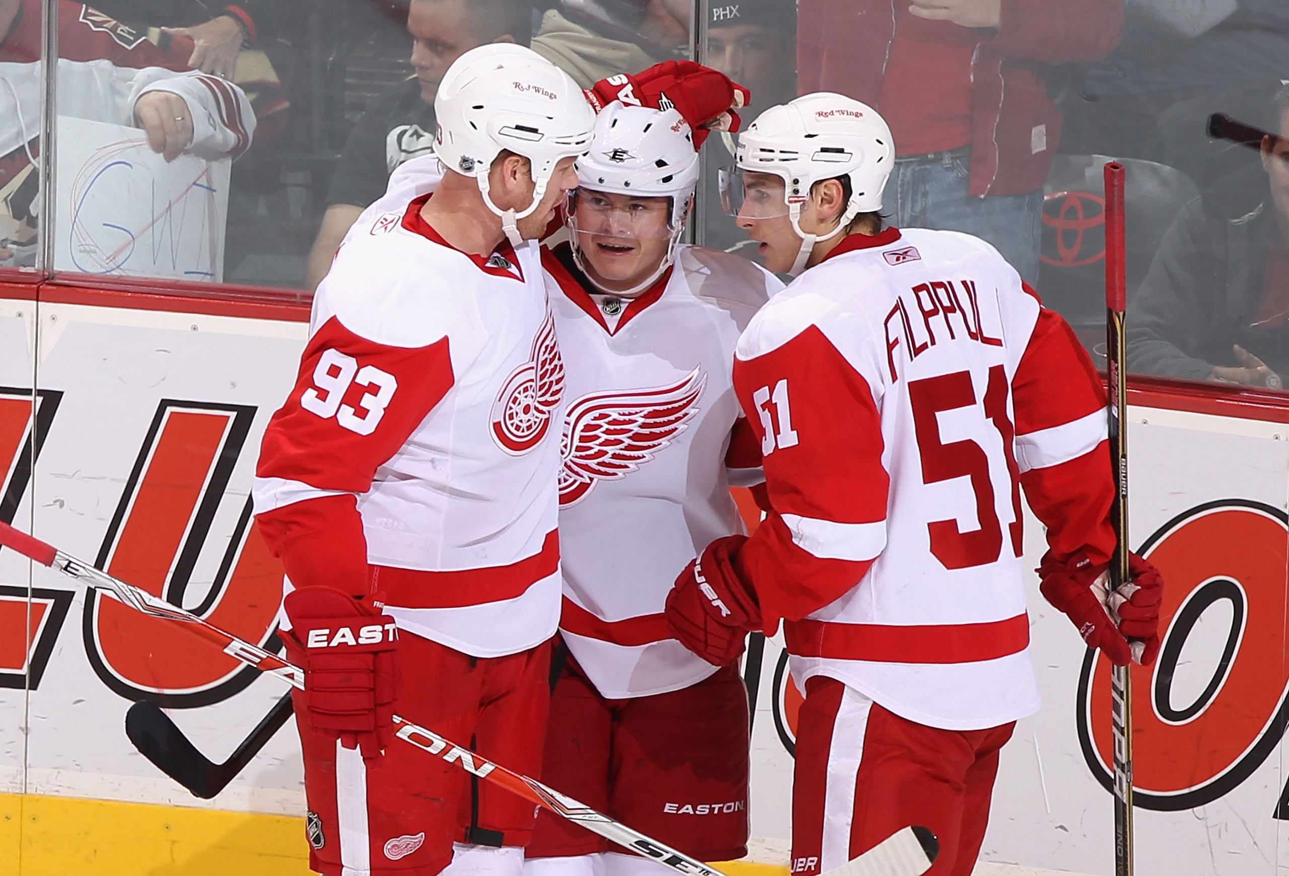 GLENDALE, AZ - MARCH 05: Johan Franzen #93, Jiri Hudler #26 and Valtteri Filppula #51 of the Detroit Red Wings celebrate after Filppula scored a second period goal against the Phoenix Coyotes during the NHL game at Jobing.com Arena on March 5, 2011 in Gl GLENDALE, AZ - MARCH 05: Johan Franzen #93, Jiri Hudler #26 and Valtteri Filppula #51 of the Detroit Red Wings celebrate after Filppula scored a second period goal against the Phoenix Coyotes during the NHL game at Jobing.com Arena on March 5, 2011 in Gl
