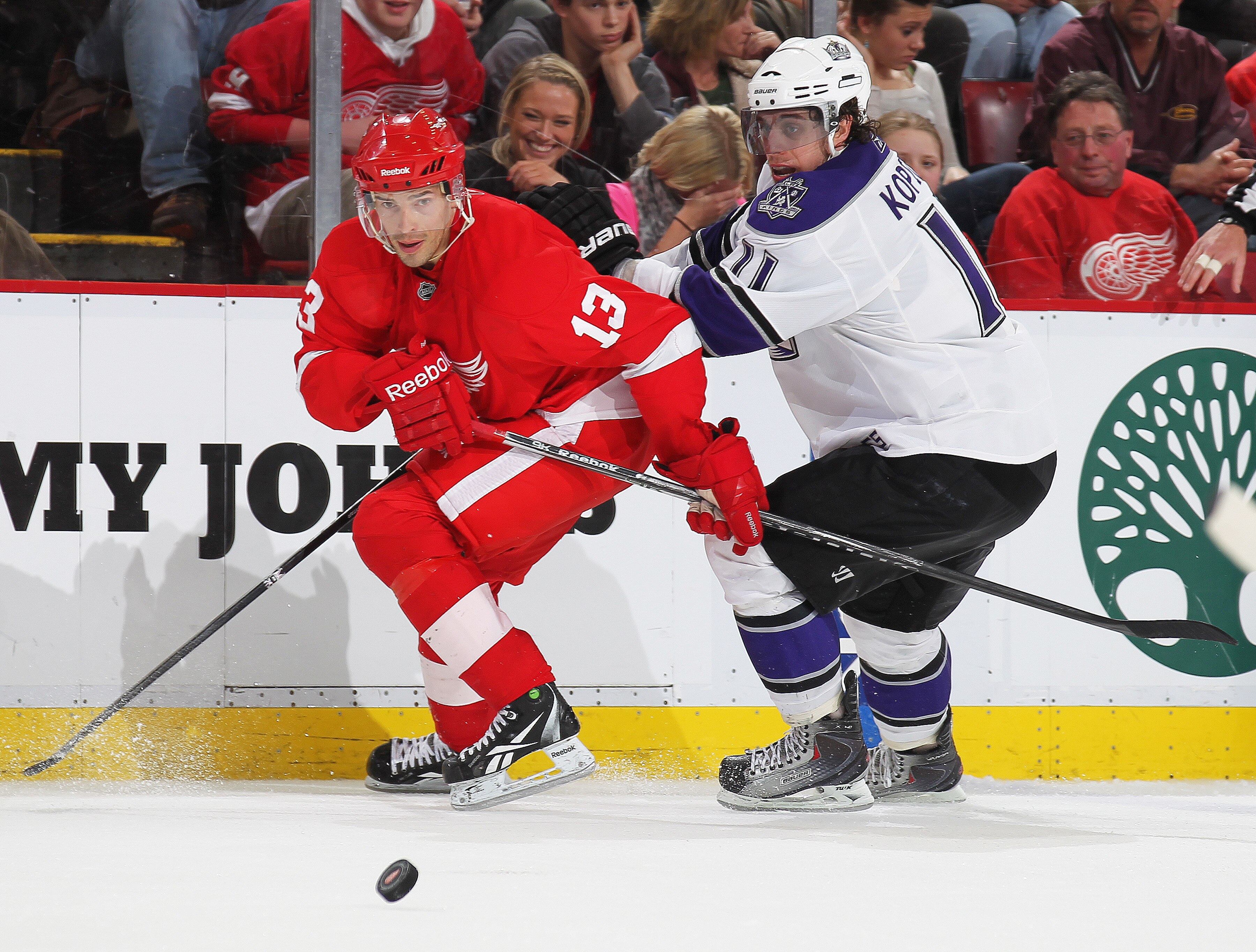 DETROIT, MI - MARCH 9:  Anze Kopitar #11 of the Los Angeles Kings tries to hold up Pavel Datsyuk #13 of the Detroit Red Wings in a game on March 9, 2011 at the Joe Louis Arena in Detroit, Michigan. The Kings defeated the Wings 2-1. (Photo by Claus Anderse