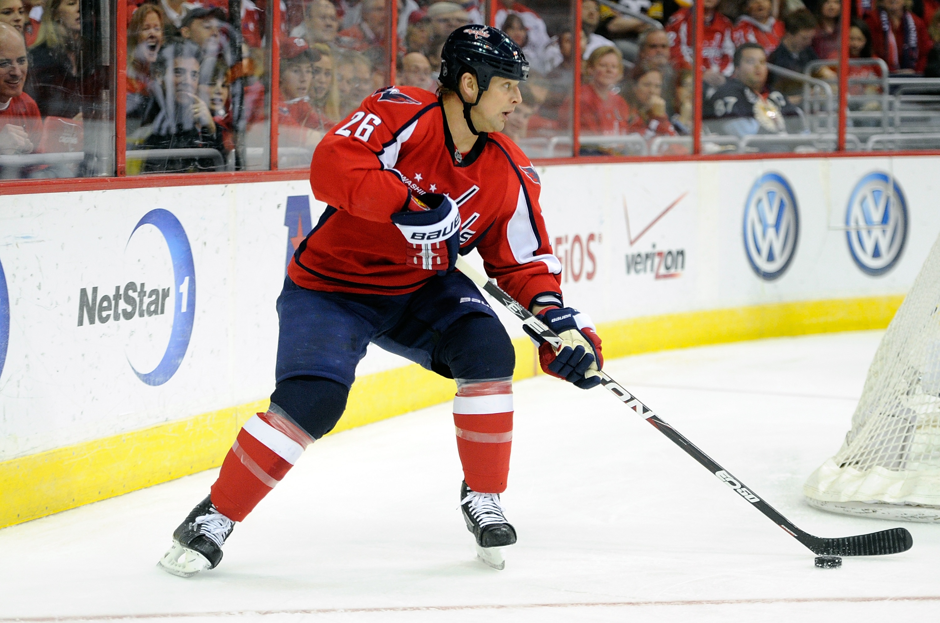 WASHINGTON, DC - FEBRUARY 06:  Matt Hendricks #26 of the Washington Capitals handles the puck against the Pittsburgh Penguins at the Verizon Center on February 6, 2011 in Washington, DC.  (Photo by Greg Fiume/Getty Images)