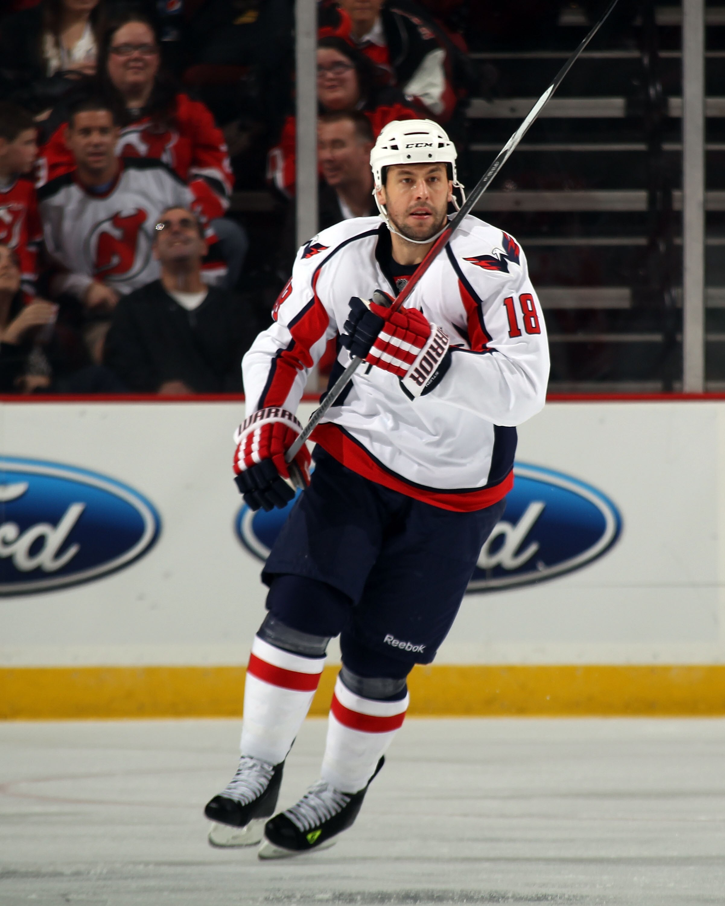 NEWARK, NJ - MARCH 18: Marco Sturm #18 of the Washington Capitals skates against the New Jersey Devils at the Prudential Center on March 18, 2011 in Newark, New Jersey. The Capitals shut out the Devils 3-0.  (Photo by Bruce Bennett/Getty Images)