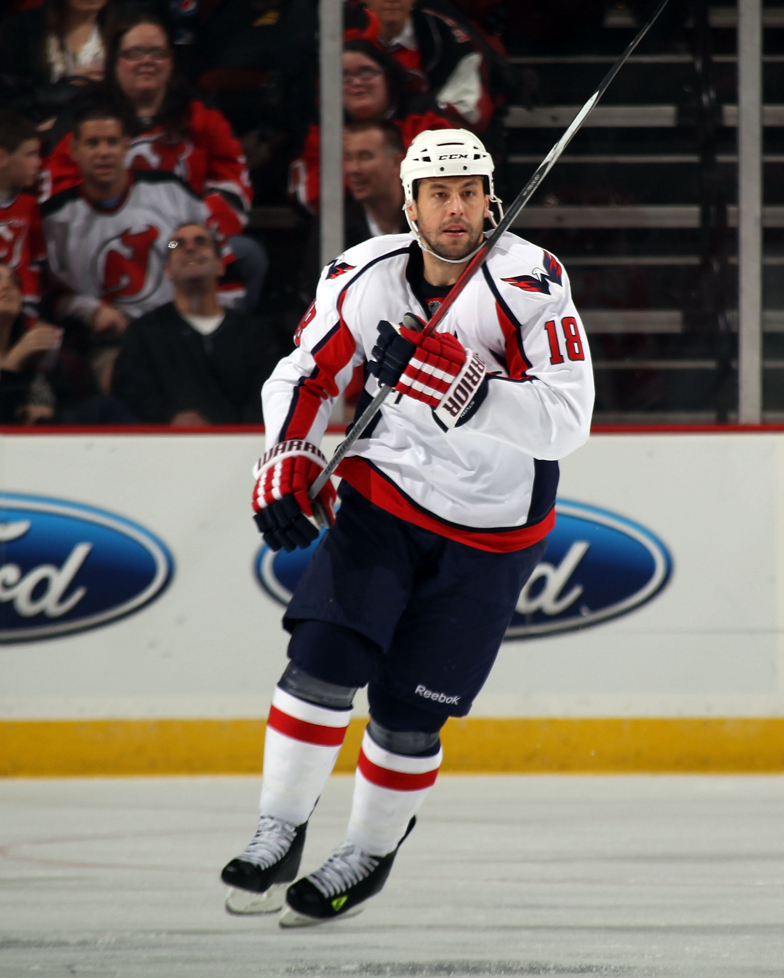 NEWARK, NJ - MARCH 18: Marco Sturm #18 of the Washington Capitals skates against the New Jersey Devils at the Prudential Center on March 18, 2011 in Newark, New Jersey. The Capitals shut out the Devils 3-0.  (Photo by Bruce Bennett/Getty Images)
