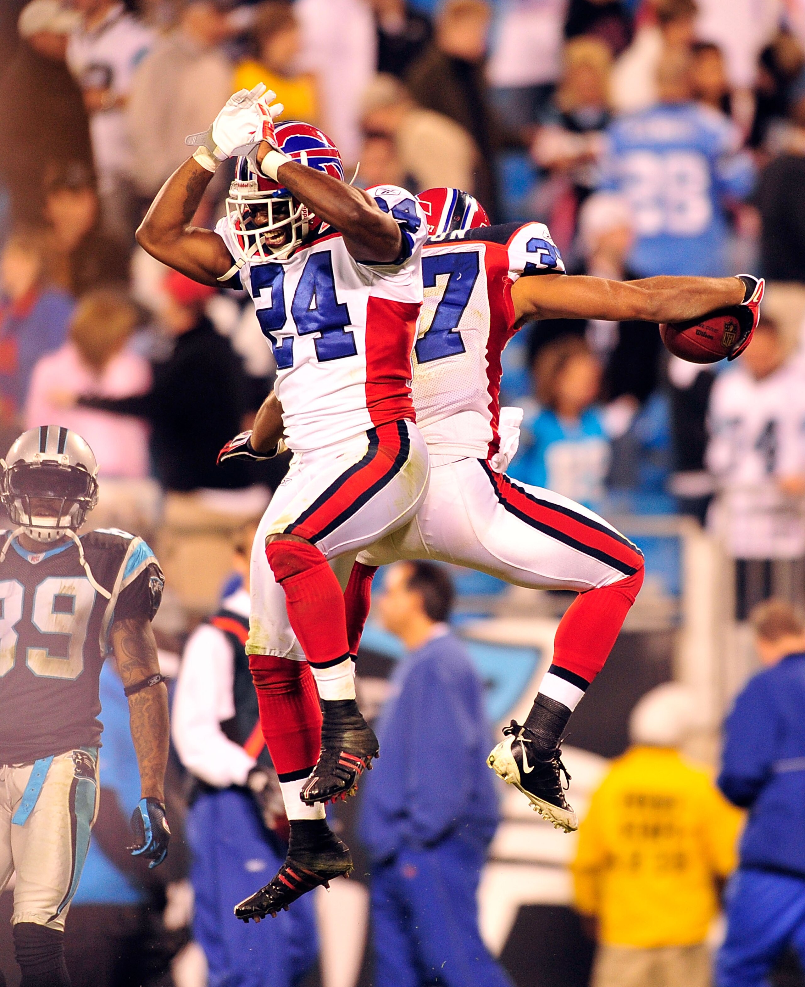 CHARLOTTE, NC - OCTOBER 25:  Terrence McGee #24 and George Wilson #37 of the Buffalo Bills celebrate after Wilson's fourth-quarter interception against the Carolina Panthers at Bank of America Stadium on October 25, 2009 in Charlotte, North Carolina. Buff