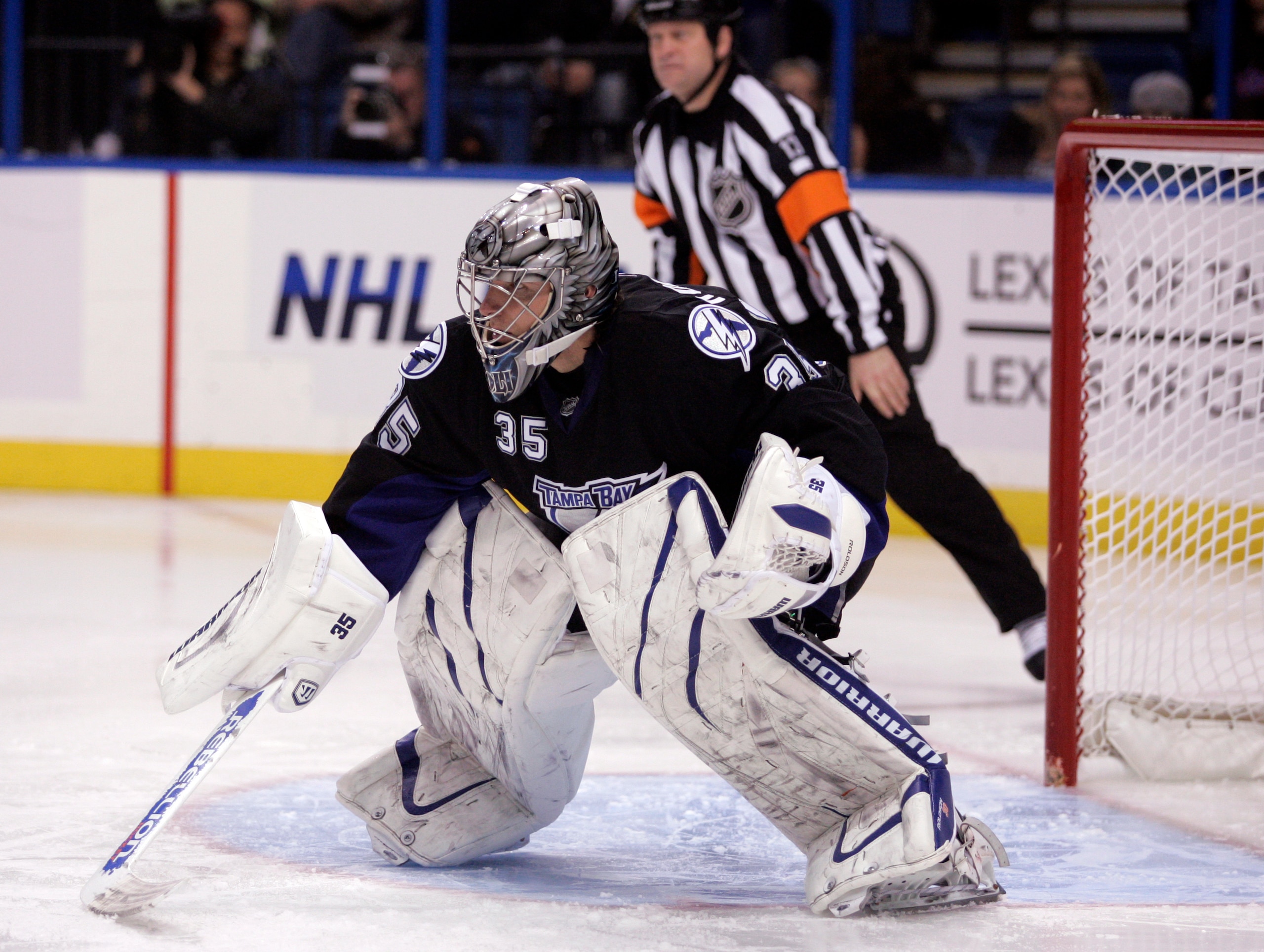 TAMPA, FL - JANUARY 25: Dwayne Roloson #35 of the Tampa Bay Lightning protects the net against the Toronto Maple Leafs at St. Pete Times Forum on January 25, 2011 in Tampa, Florida. The Lightning defeated the Leafs 2-0. (Photo by Justin K. Aller/Getty Ima TAMPA, FL - JANUARY 25: Dwayne Roloson #35 of the Tampa Bay Lightning protects the net against the Toronto Maple Leafs at St. Pete Times Forum on January 25, 2011 in Tampa, Florida. The Lightning defeated the Leafs 2-0. (Photo by Justin K. Aller/Getty Ima