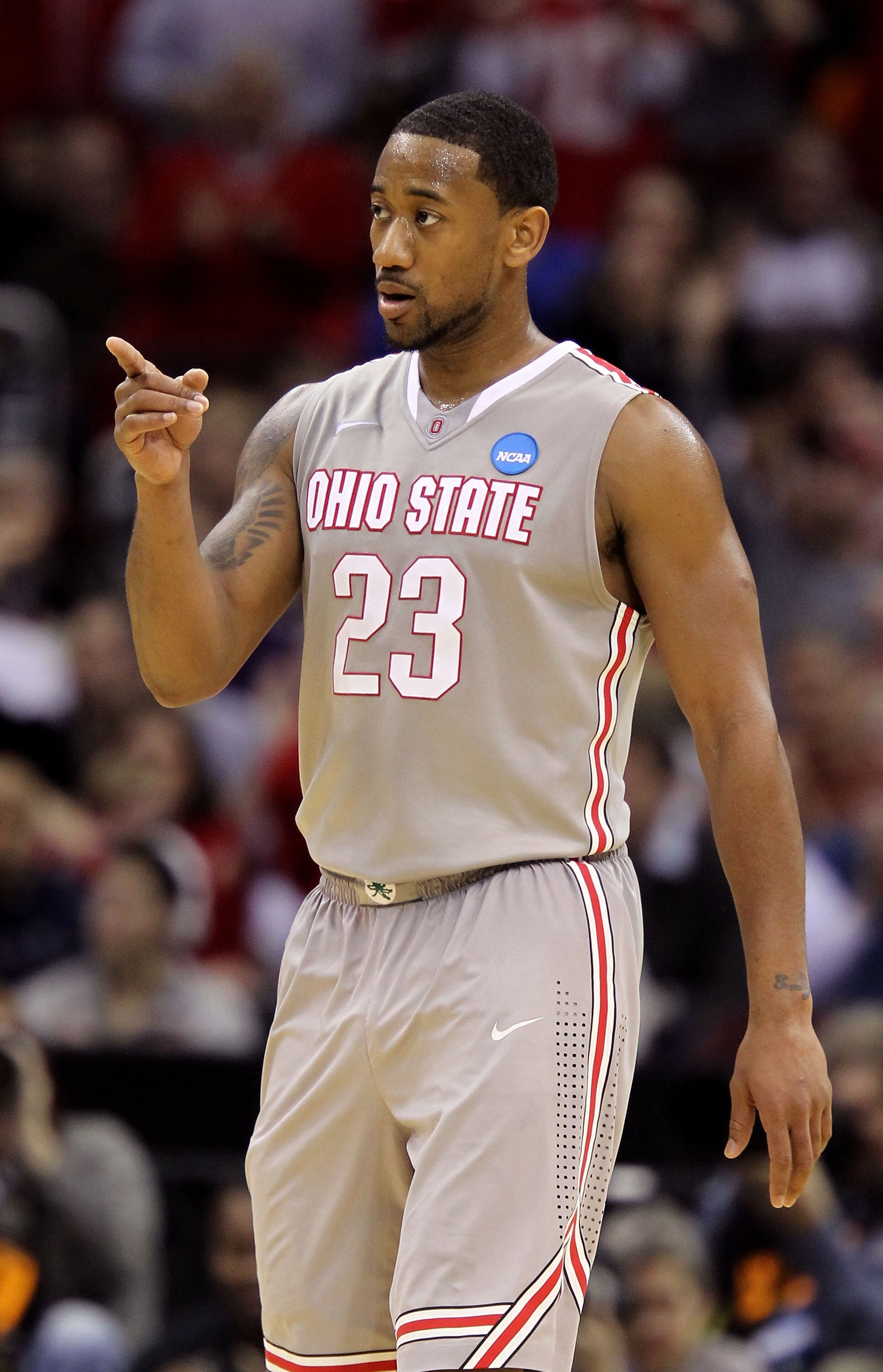 CLEVELAND, OH - MARCH 20: David Lighty #23 of the Ohio State Buckeyes reacts after a play in the second half against the George Mason Patriots during the third of the 2011 NCAA men's basketball tournament at Quicken Loans Arena on March 20, 2011 in Clevel