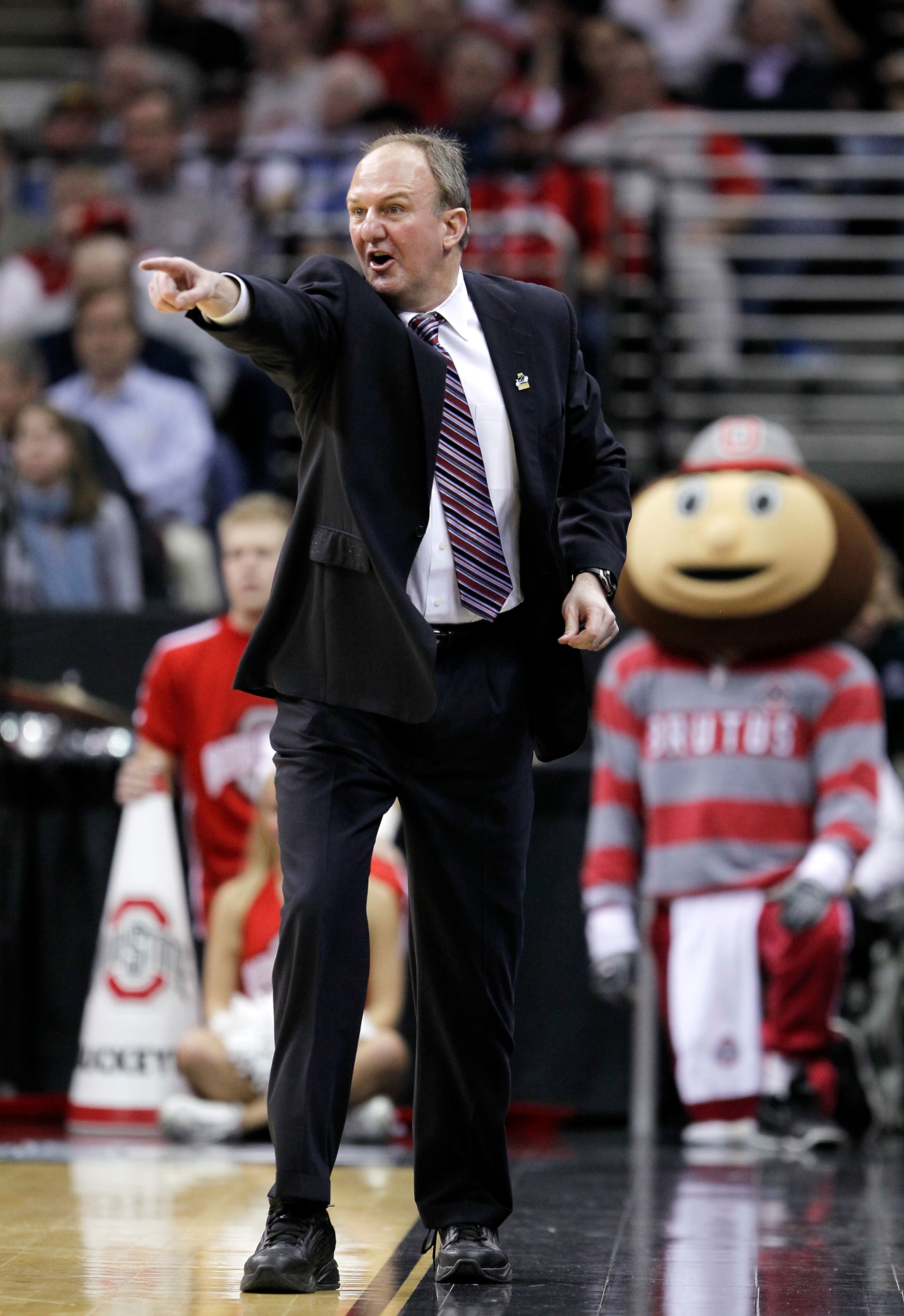 CLEVELAND, OH - MARCH 18: Head coach Thad Matta of the Ohio State Buckeyes gestures from the bench during the game against the Texas-San Antonio Roadrunners during the second round of the 2011 NCAA men's basketball tournament at Quicken Loans Arena on Mar