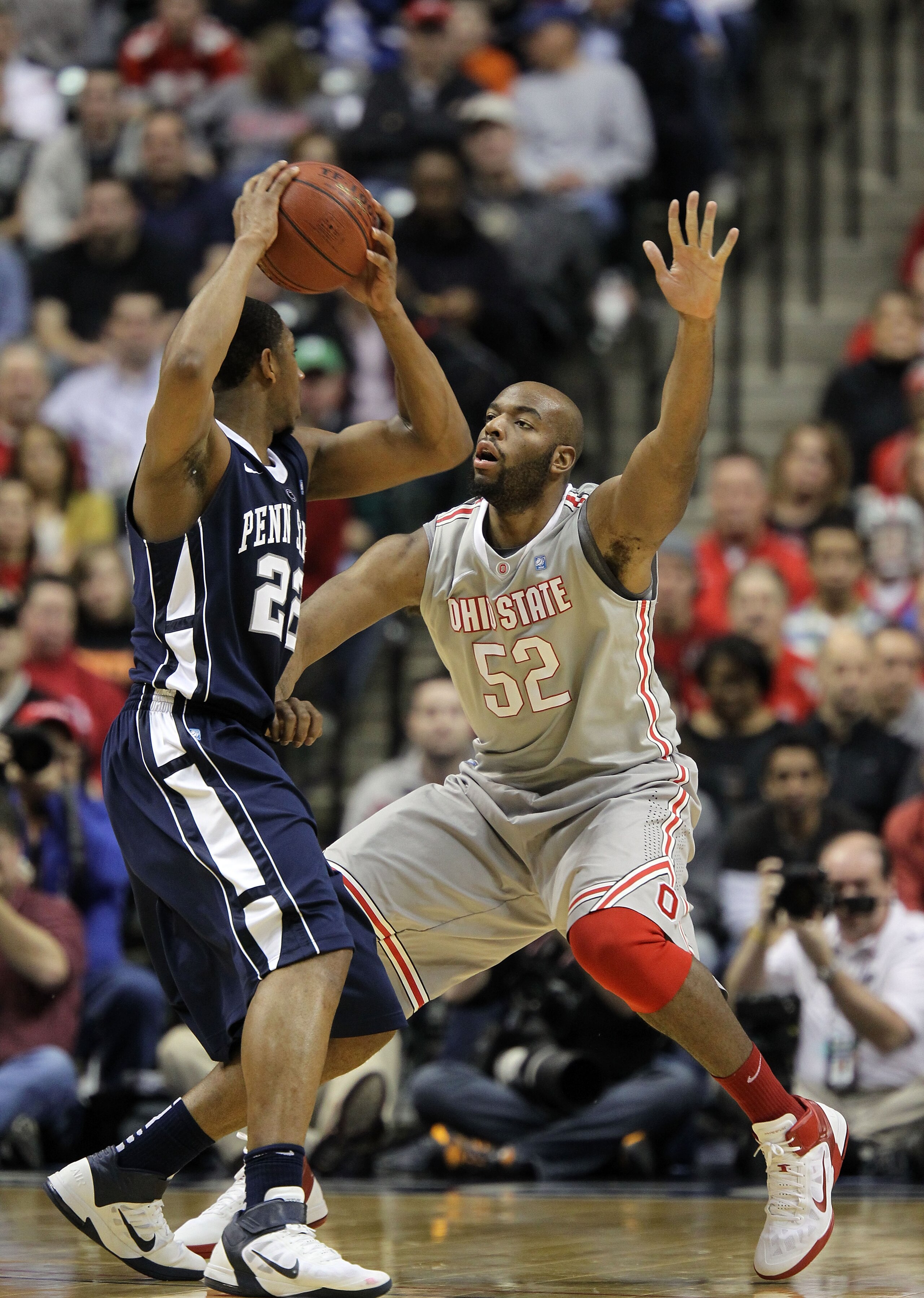INDIANAPOLIS, IN - MARCH 13:  Dallas Lauderdale #52 of the Ohio State Buckeyes defends against Andrew Jones #22 of the Penn State Nittany Lions during the championship game of the 2011 Big Ten Men's Basketball Tournament at Conseco Fieldhouse on March 13,