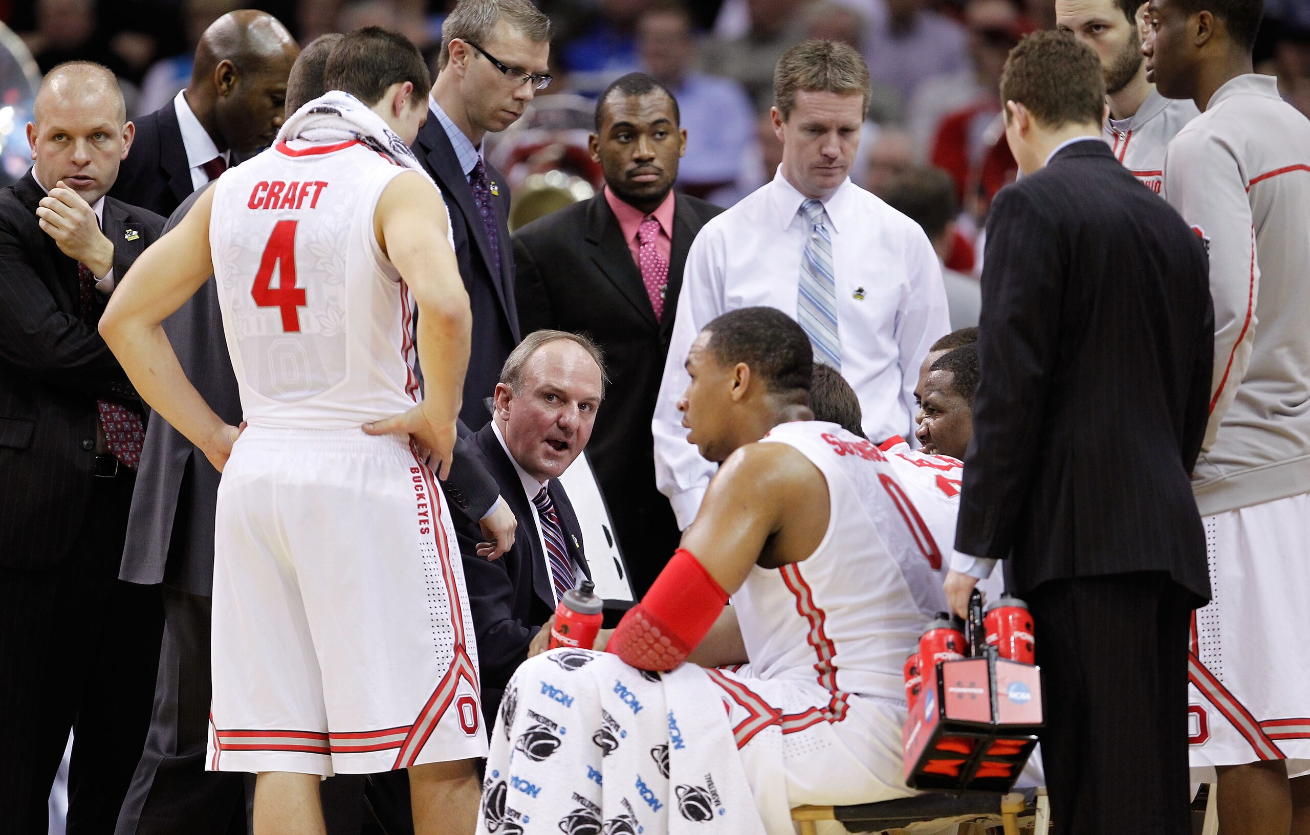 CLEVELAND, OH - MARCH 18: Head coach Thad Matta of the Ohio State Buckeyes speaks to his team during a timeout against the Texas-San Antonio Roadrunners during the second round of the 2011 NCAA men's basketball tournament at Quicken Loans Arena on March 1