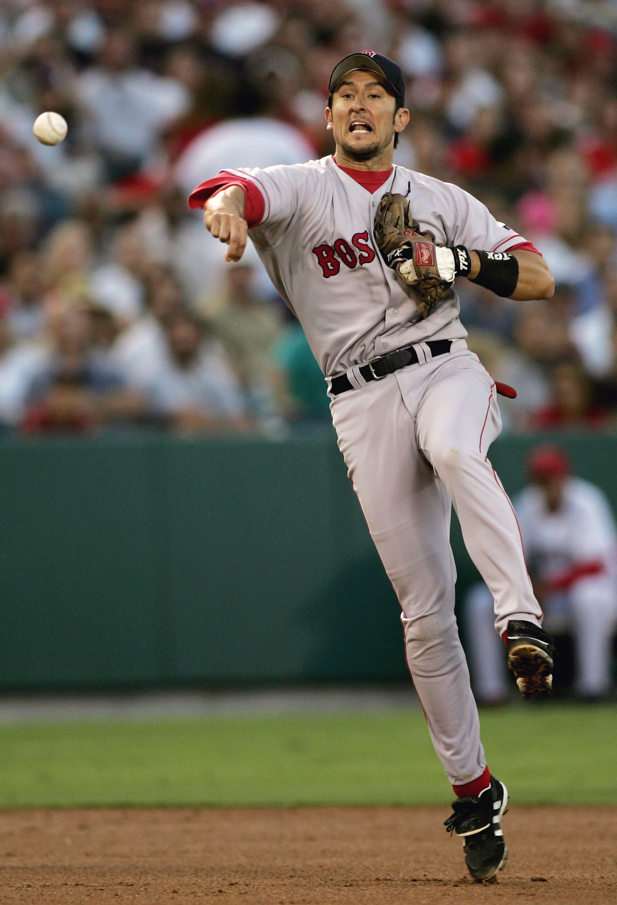ANAHEIM, CA - JULY 15:  Shortstop Nomar Garciaparra #5 of the Boston Red Sox throws to first to record the force out on David Eckstein #22 of the Anaheim Angels on July 15, 2004 at the Angel Stadium of Anaheim in Anaheim, California.  (Photo by Doug Benc/
