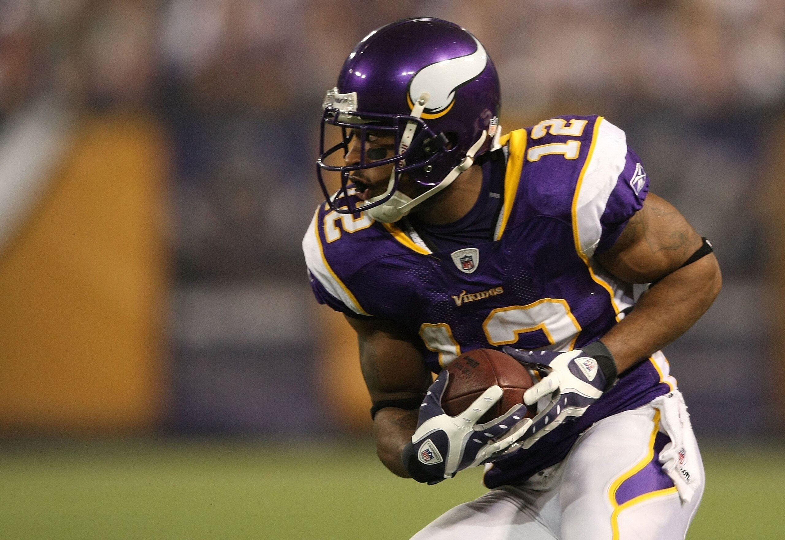 MINNEAPOLIS - NOVEMBER 22:  Percy Harvin #12 of the Minnesota Vikings runs the ball against the Seattle Seahawks at Hubert H. Humphrey Metrodome on November 22, 2009 in Minneapolis, Minnesota.  (Photo by Nick Laham/Getty Images)
