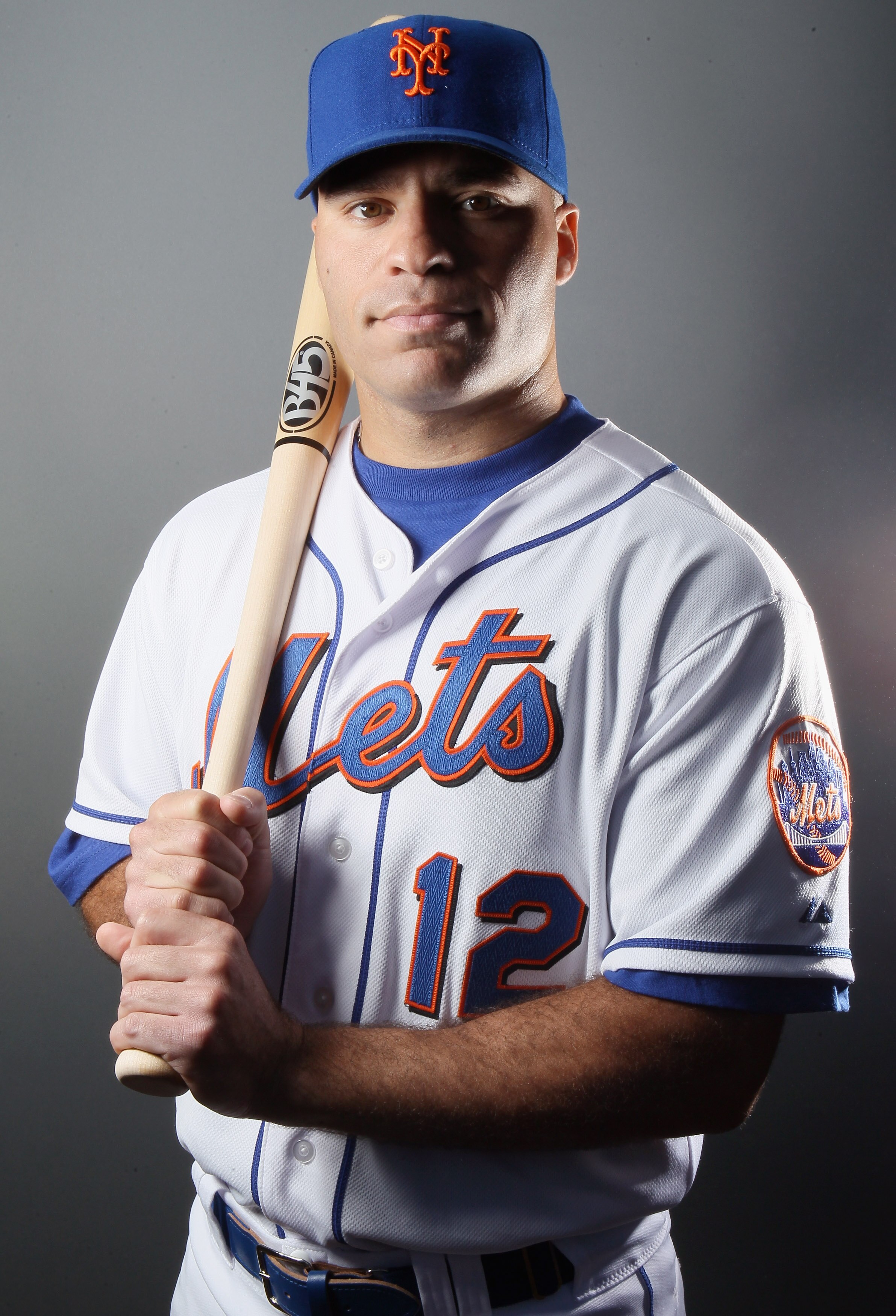 PORT ST. LUCIE, FL - FEBRUARY 24:  RY 24:  Scott Hairston #12 of the New York Mets poses for a portrait during the New York Mets Photo Day on February 24, 2011 at Digital Domain Park in Port St. Lucie, Florida.  (Photo by Elsa/Getty Images)