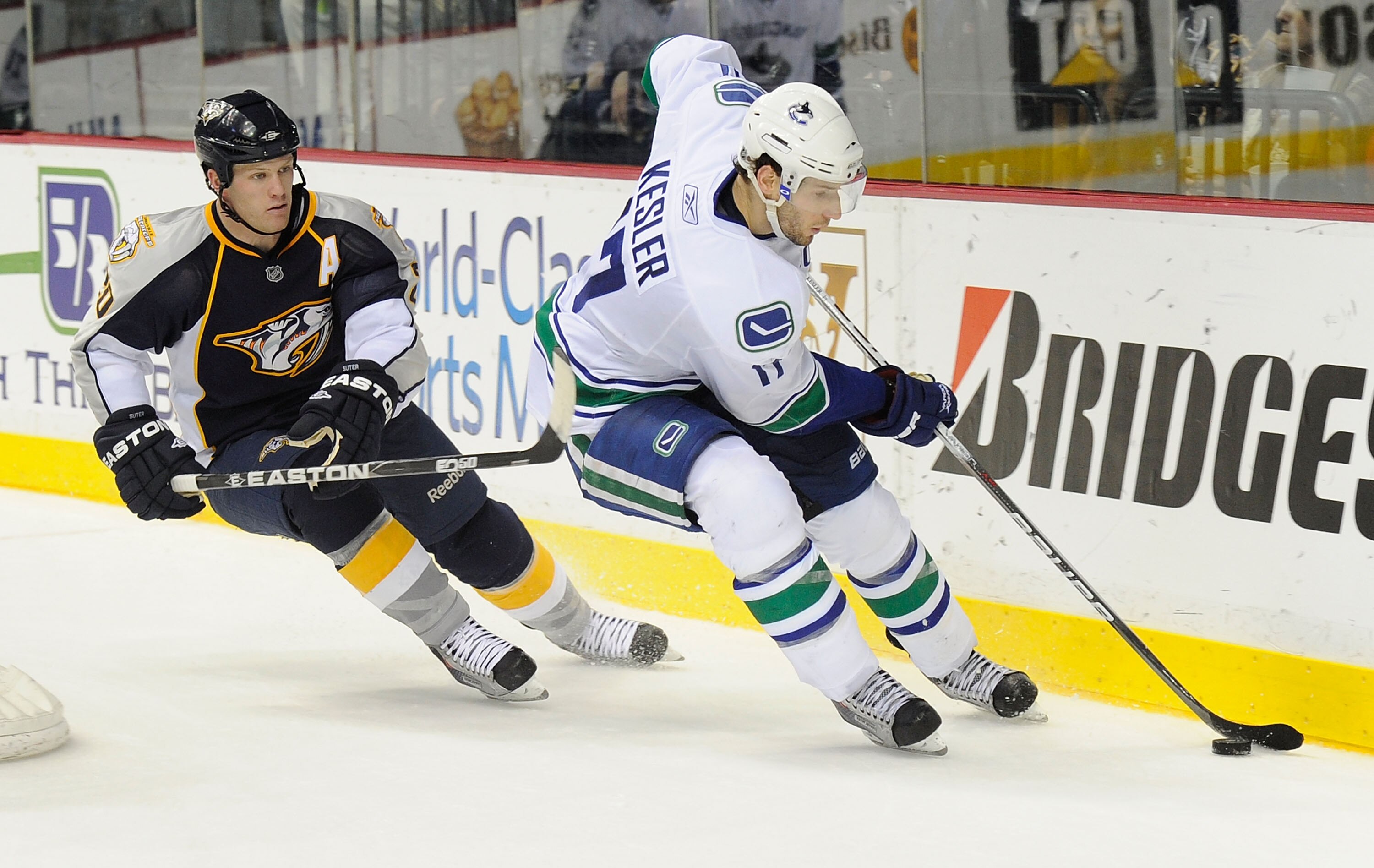 NASHVILLE, TN - FEBRUARY 17:  Ryan Kesler #17 of the Vancouver Canucks skates against Ryan Suter #20 of the Nashville Predators on February 17, 2011 at the Bridgestone Arena in Nashville, Tennessee.  (Photo by Frederick Breedon/Getty Images)