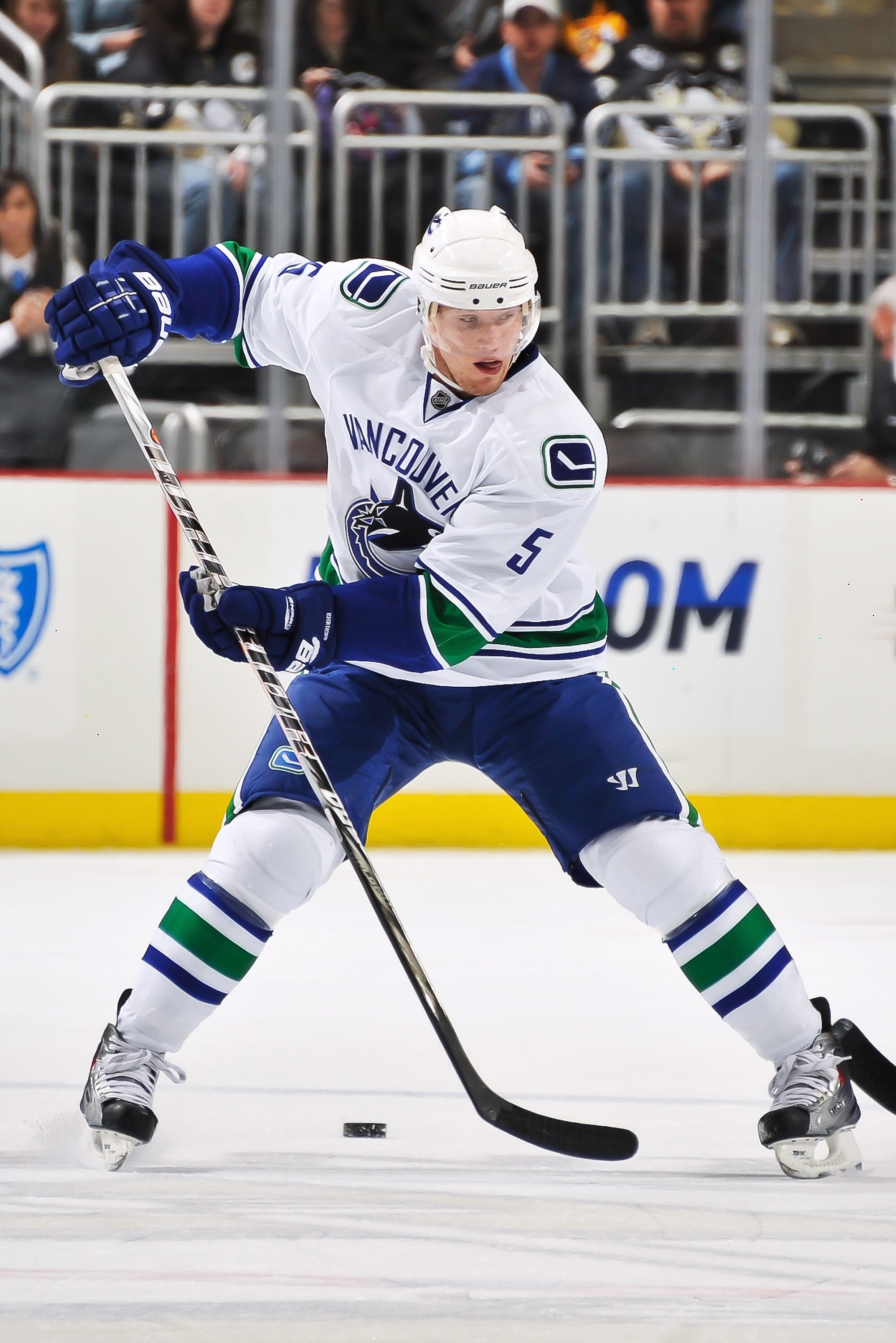 PITTSBURGH - NOVEMBER 17:  Christian Ehrhoff #5 of the Vancouver Canucks skates with the puck against the Pittsburgh Penguins on November 17, 2010 at Consol Energy Center in Pittsburgh, Pennsylvania.  (Photo by Jamie Sabau/Getty Images)