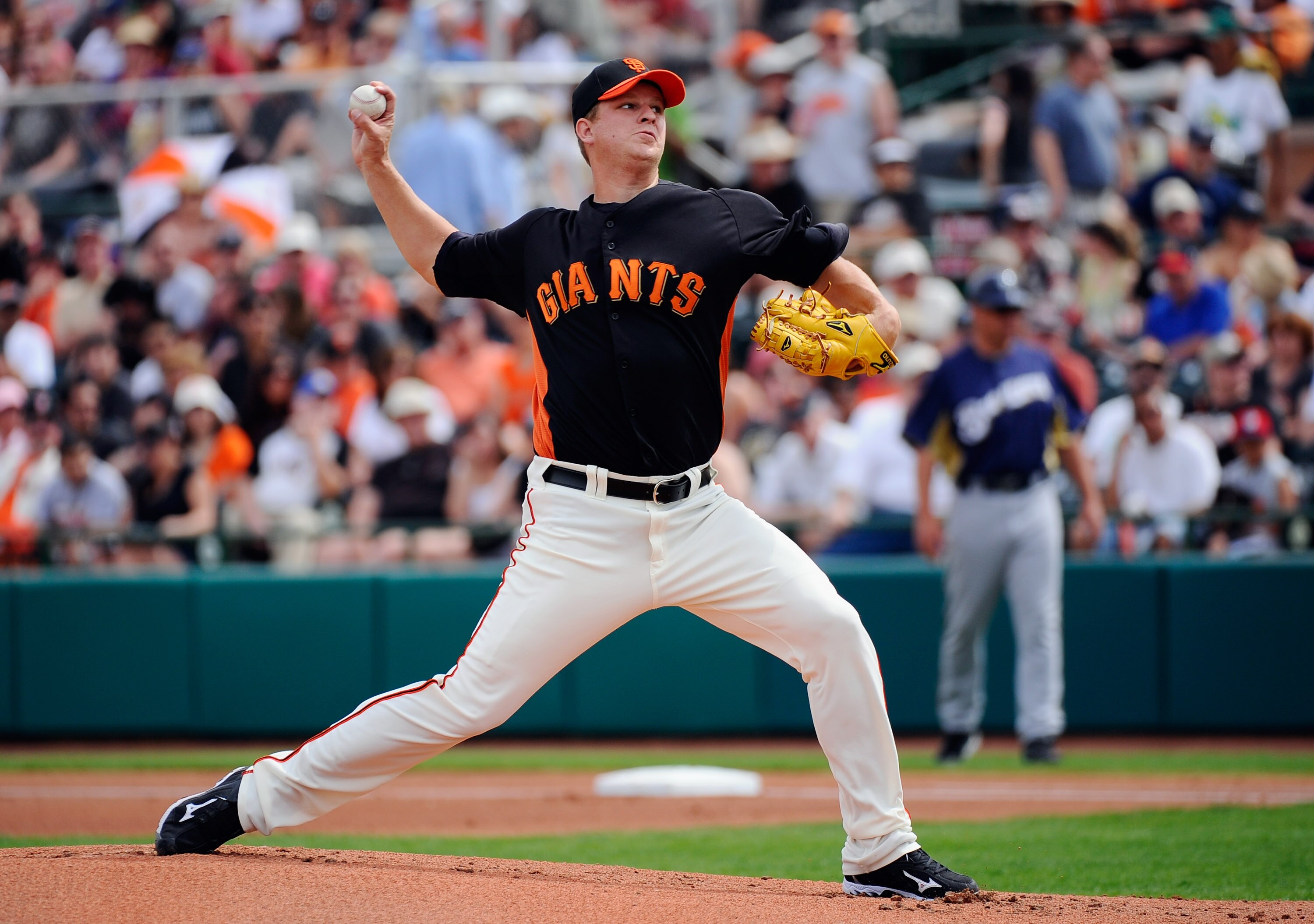 SCOTTSDALE, AZ - MARCH 14:  Matt Cain #18 of the San Francisco Giants throws a pitch against the Milwaukee Brewers during a spring training game at Scottsdale Stadium on March 14, 2011 in Scottsdale, Arizona.  (Photo by Kevork Djansezian/Getty Images)