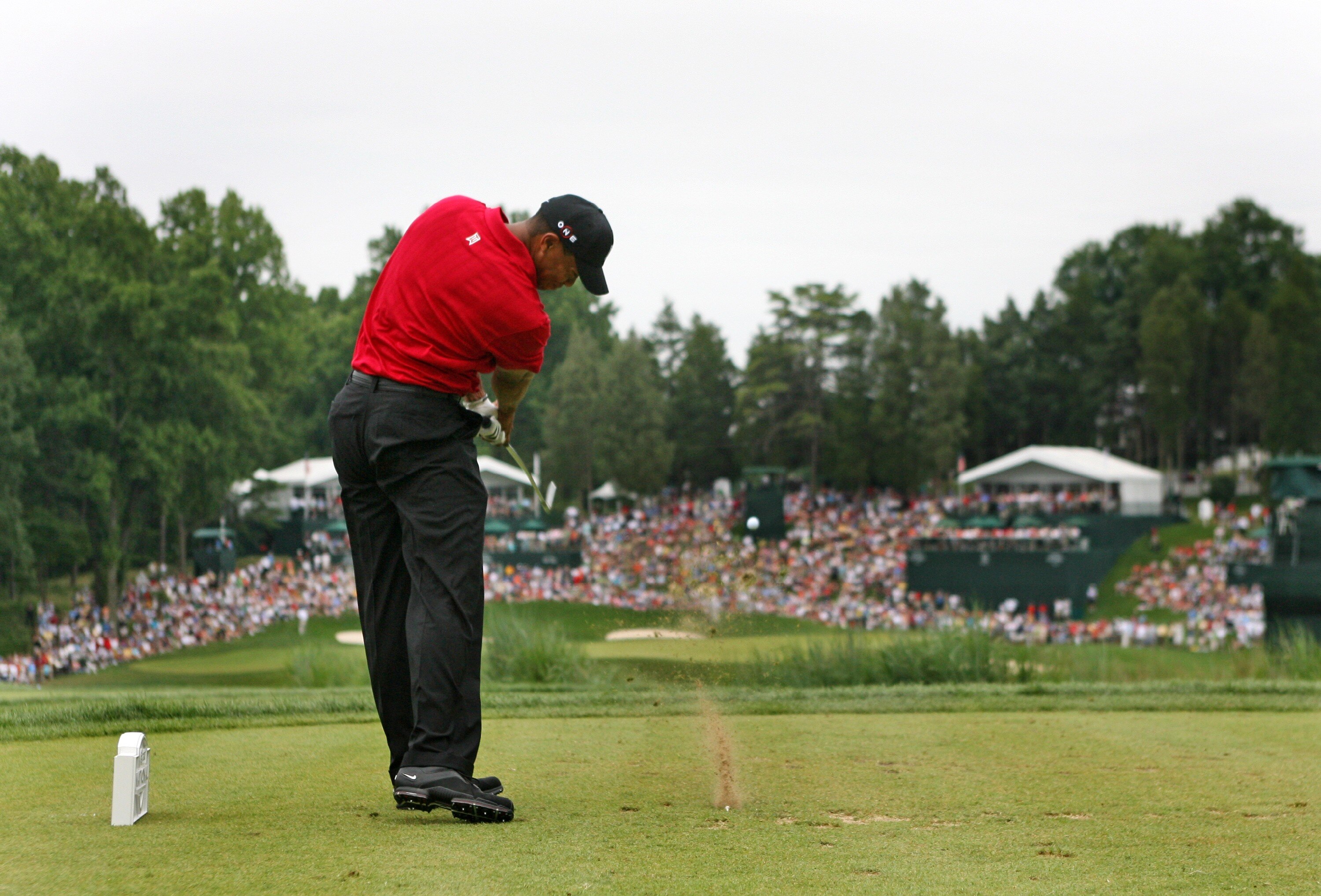 BETHESDA, MD - JULY 5 : Tiger Woods hits his tee shot on the 10th hole during the final round of the AT&T National hosted by Tiger Woods at Congressional Country Club on July 5, 2009 in Bethesda, Maryland. (Photo by Hunter Martin/Getty Images)