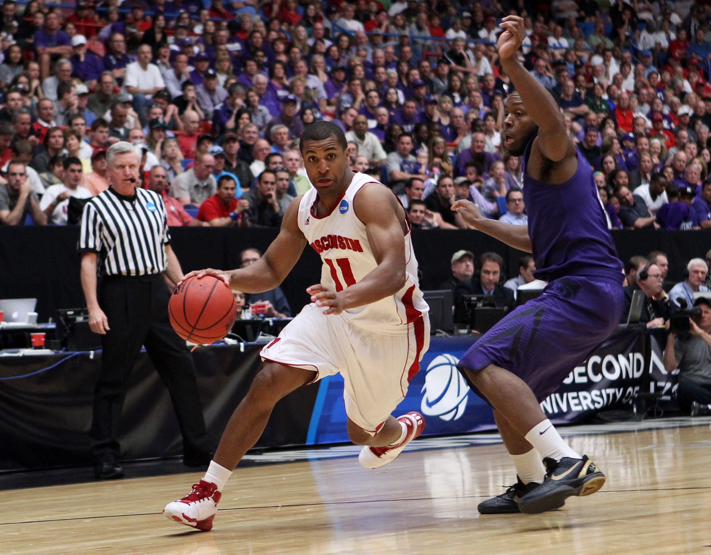 TUCSON, AZ - MARCH 19:  Jordan Taylor #11 of the Wisconsin Badgers drives against Jacob Pullen #0 of the Kansas State Wildcats during the third round of the 2011 NCAA men's basketball tournament at McKale Center on March 19, 2011 in Tucson, Arizona.  (Pho