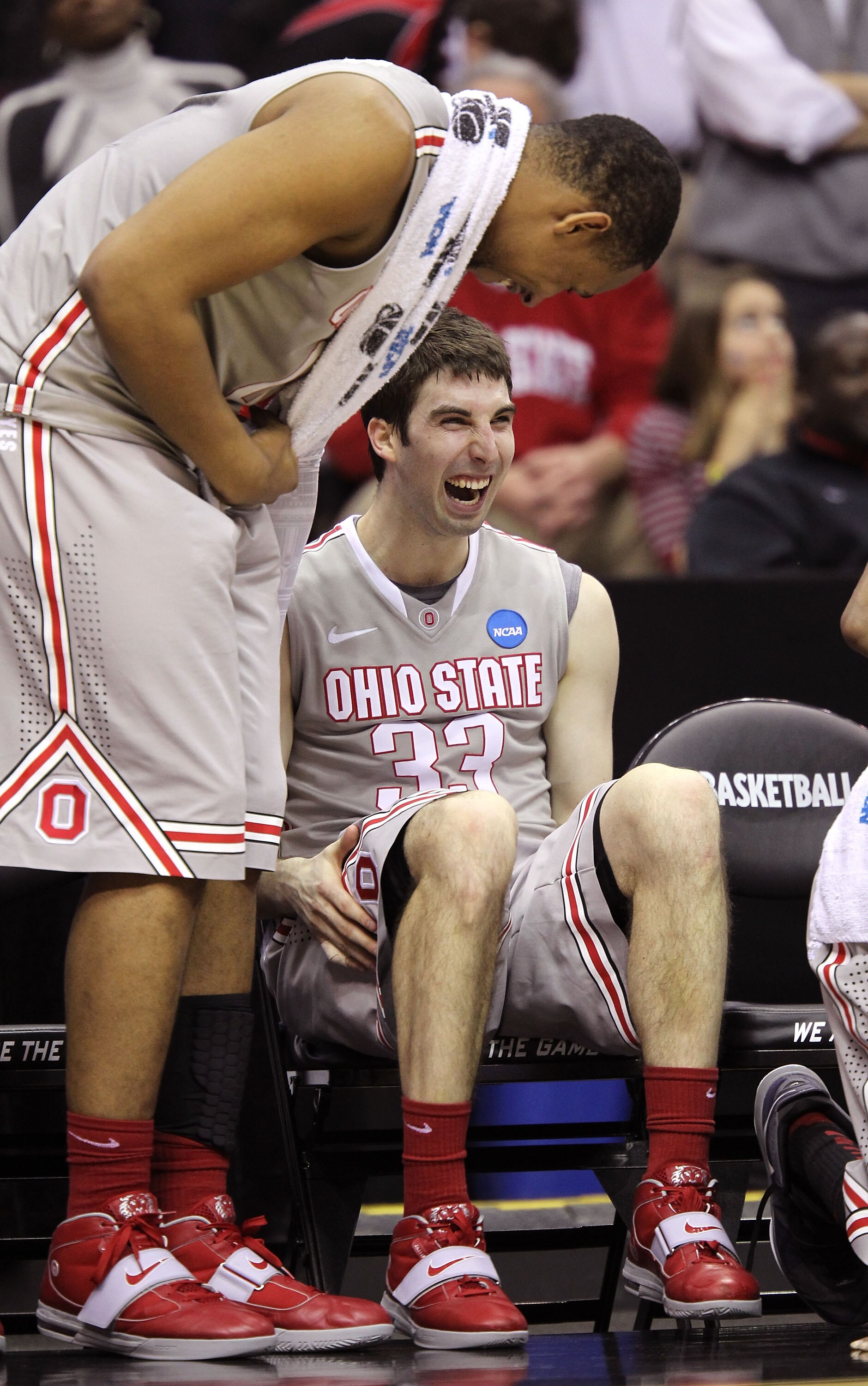 CLEVELAND, OH - MARCH 20: Jared Sullinger #0 and Jon Diebler #33 of the Ohio State Buckeyes look on from the bench late in the second half against the George Mason Patriots during the third of the 2011 NCAA men's basketball tournament at Quicken Loans Are