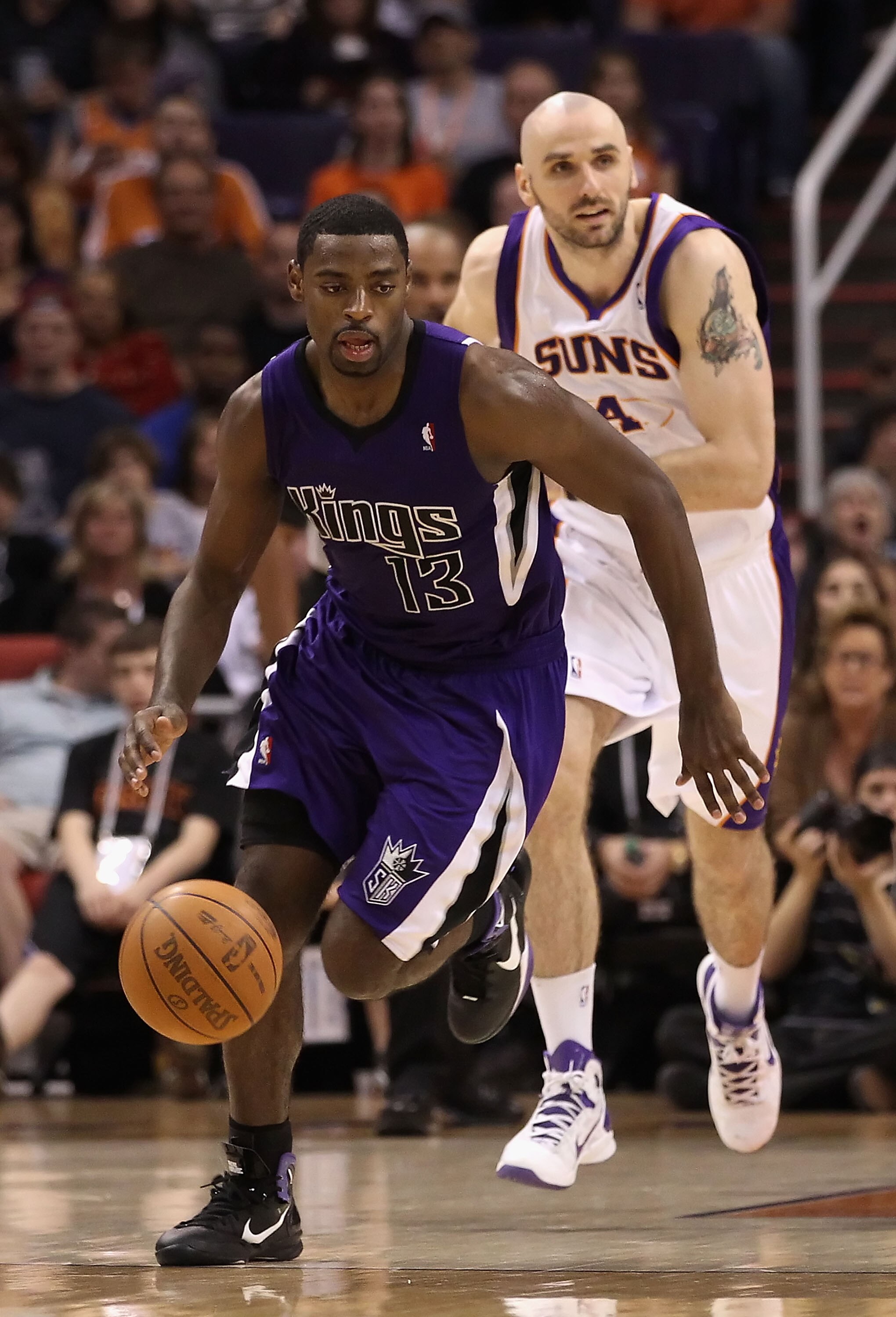 PHOENIX, AZ - FEBRUARY 13:  Tyreke Evans #13 of the Sacramento Kings handles the ball during the NBA game against the Phoenix Suns at US Airways Center on February 13, 2011 in Phoenix, Arizona.  NOTE TO USER: User expressly acknowledges and agrees that, b