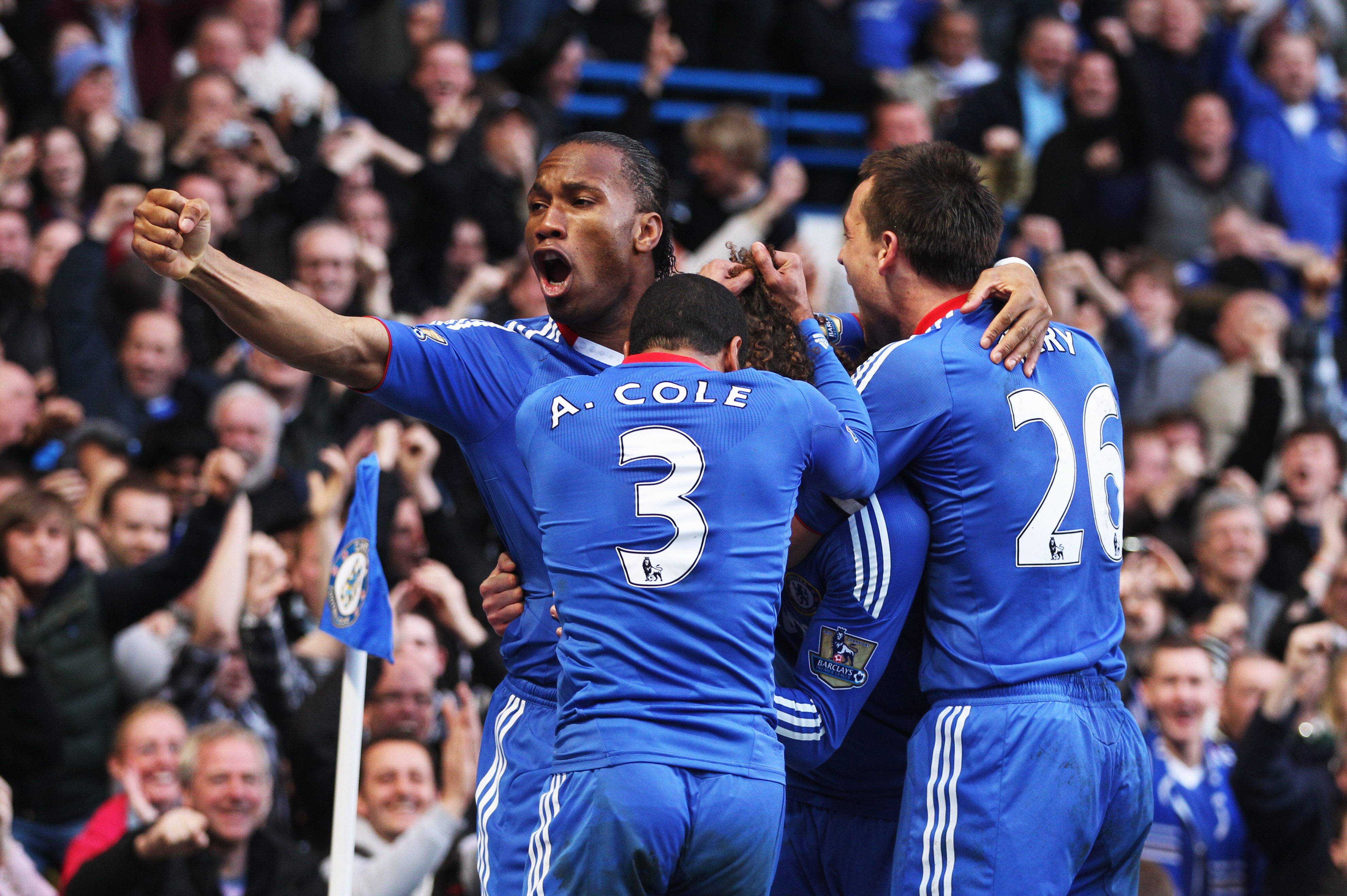 LONDON, ENGLAND - MARCH 20:  David Luiz of Chelsea (2R) celebrates with Didier Drogba (L), John Terry (R) and Ashley Cole (2L) as he scores their first goal during the Barclays Premier League match between Chelsea and Manchester City at Stamford Bridge on