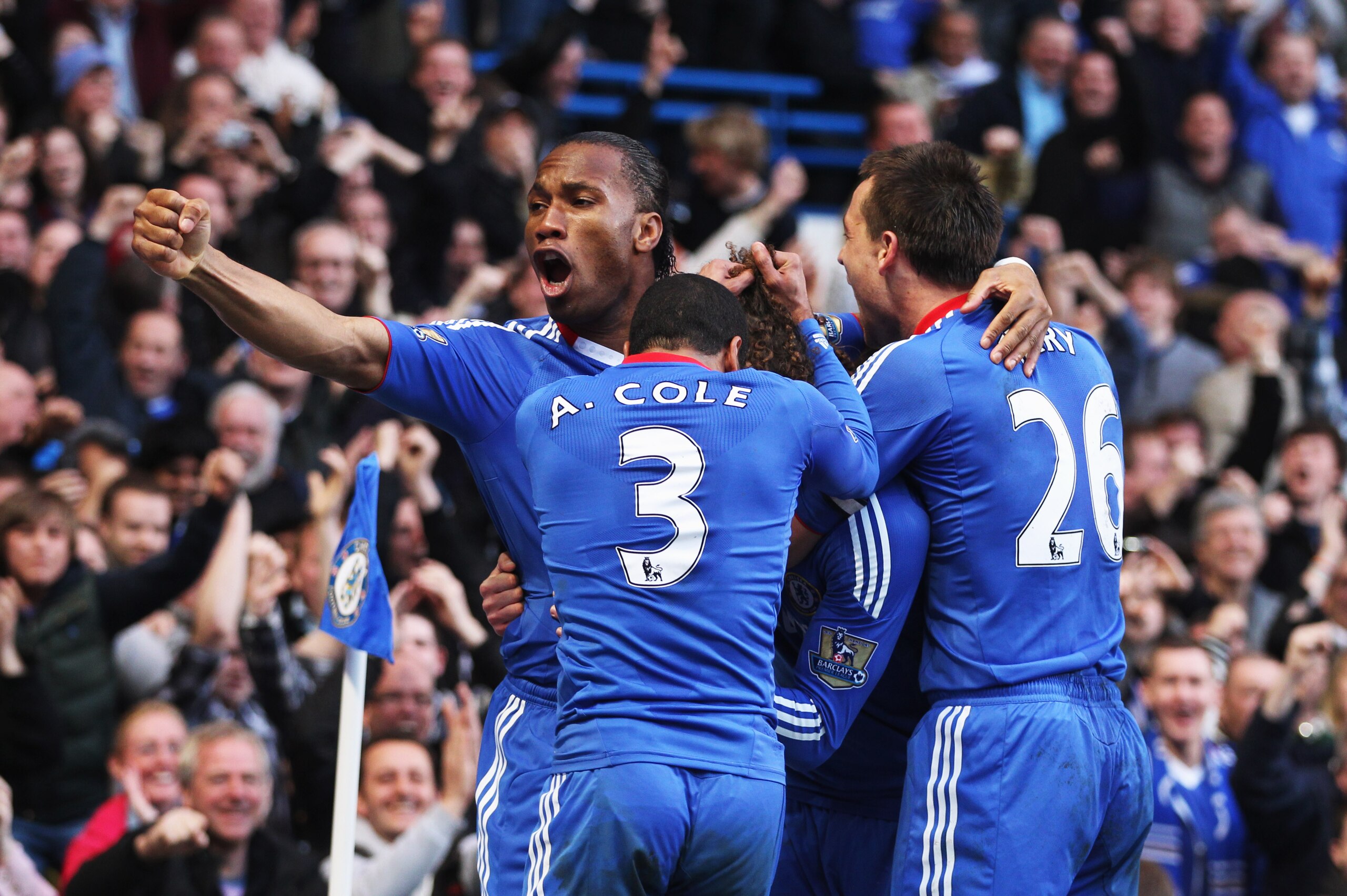 LONDON, ENGLAND - MARCH 20:  David Luiz of Chelsea (2R) celebrates with Didier Drogba (L), John Terry (R) and Ashley Cole (2L) as he scores their first goal during the Barclays Premier League match between Chelsea and Manchester City at Stamford Bridge on