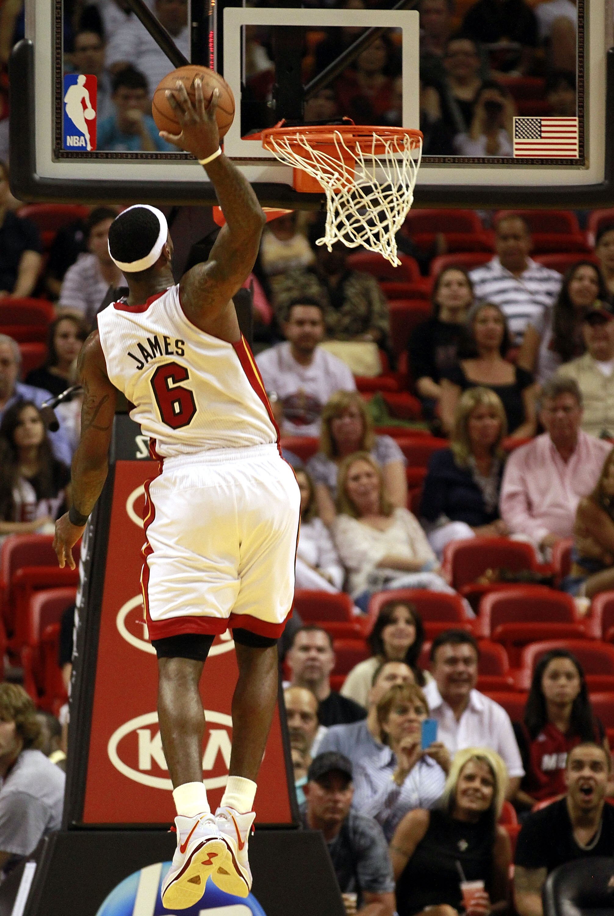 MIAMI, FL - MARCH 19:  Forward LeBron James #6 of the Miami Heat dunks against the Denver Nuggets at American Airlines Arena on March 19, 2011 in Miami, Florida. The Heat defeated the Nuggets 103-98. NOTE TO USER: User expressly acknowledges and agrees th