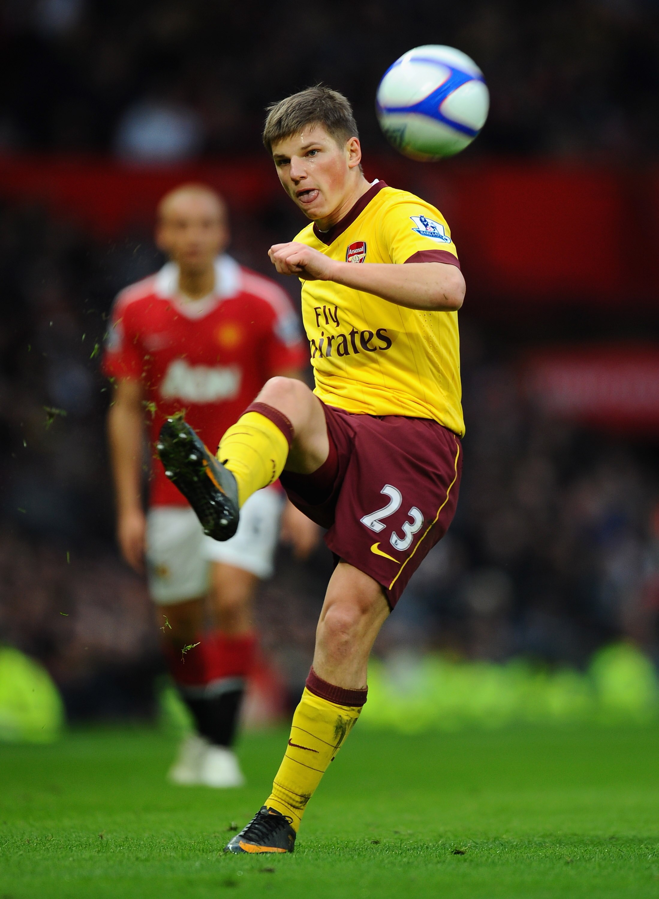MANCHESTER, ENGLAND - MARCH 12:  Andrey Arshavin of Arsenal passes the ball during the FA Cup sponsored by E.On Sixth Round match between Manchester United and Arsenal at Old Trafford on March 12, 2011 in Manchester, England.  (Photo by Clive Mason/Getty