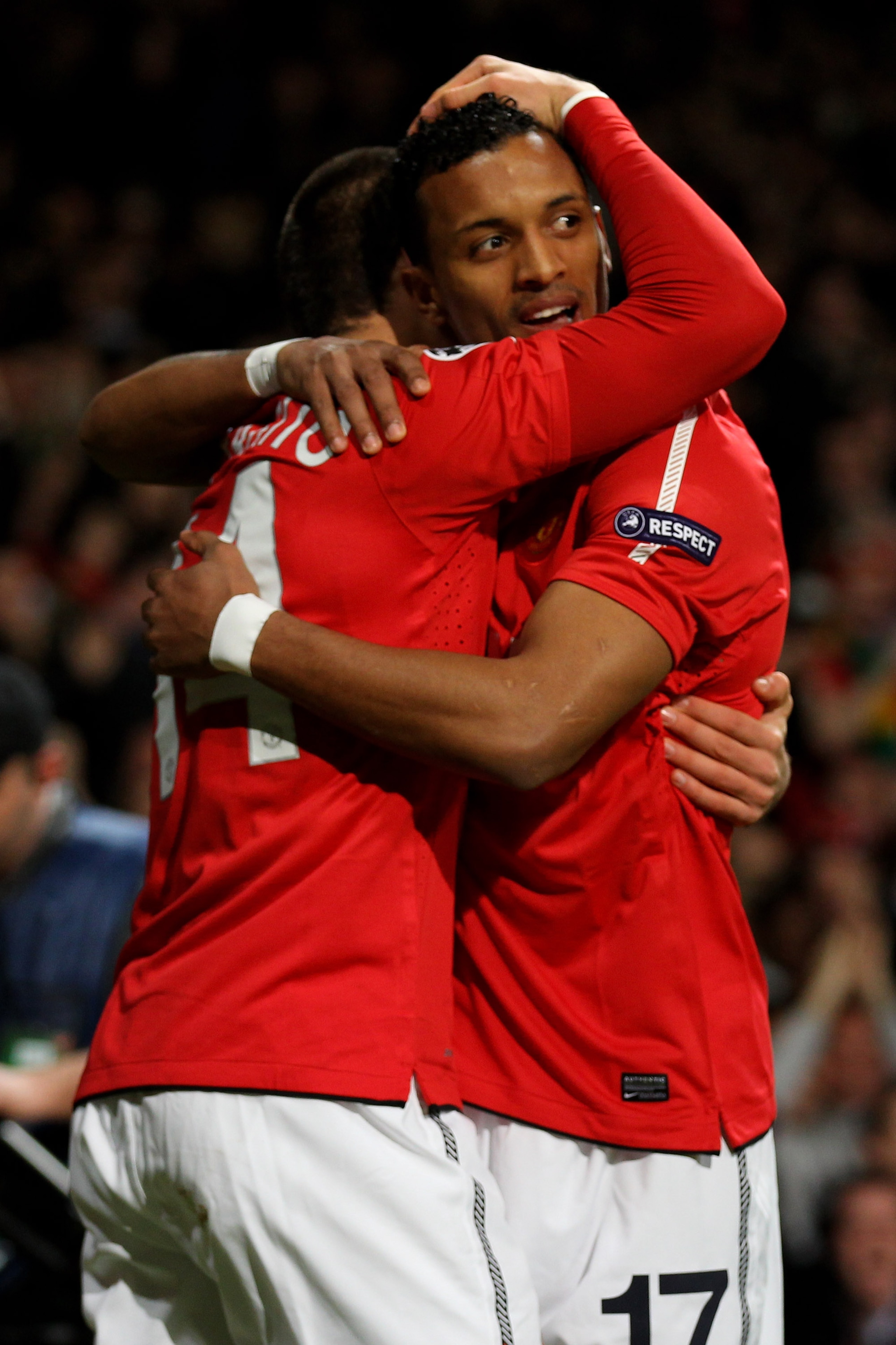MANCHESTER, ENGLAND - MARCH 15:  Javier Hernandez (L) of Manchester United celebrates scoring the opening goal with teammate Nani during the UEFA Champions League round of 16 second leg match between Manchester United and Marseille at Old Trafford on Marc