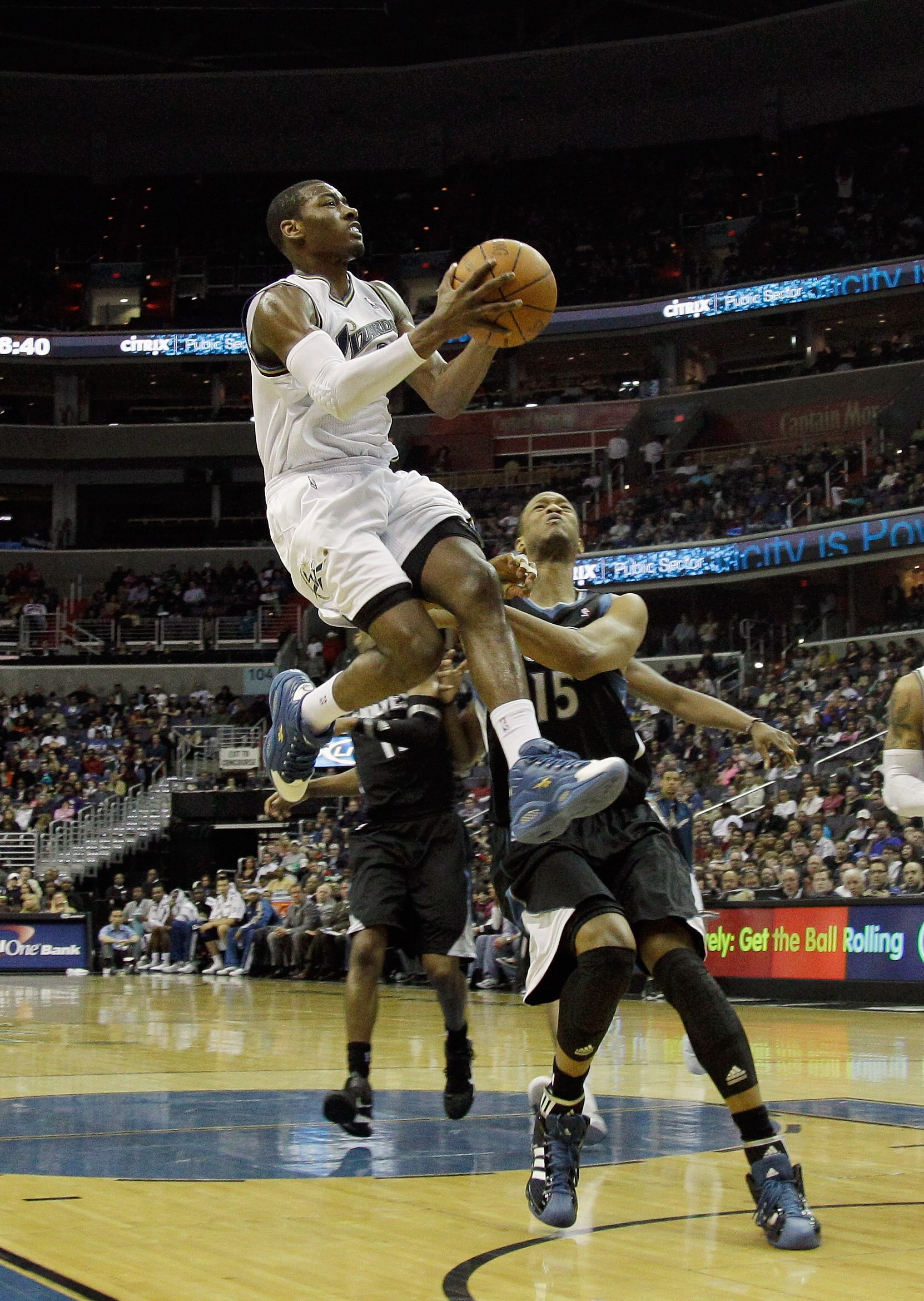 WASHINGTON, DC - MARCH 05:  John Wall #2 of the Washington Wizards puts up a shot against the Minnesota Timberwolves at the Verizon Center on March 5, 2011 in Washington, DC. NOTE TO USER: User expressly acknowledges and agrees that, by downloading and/or